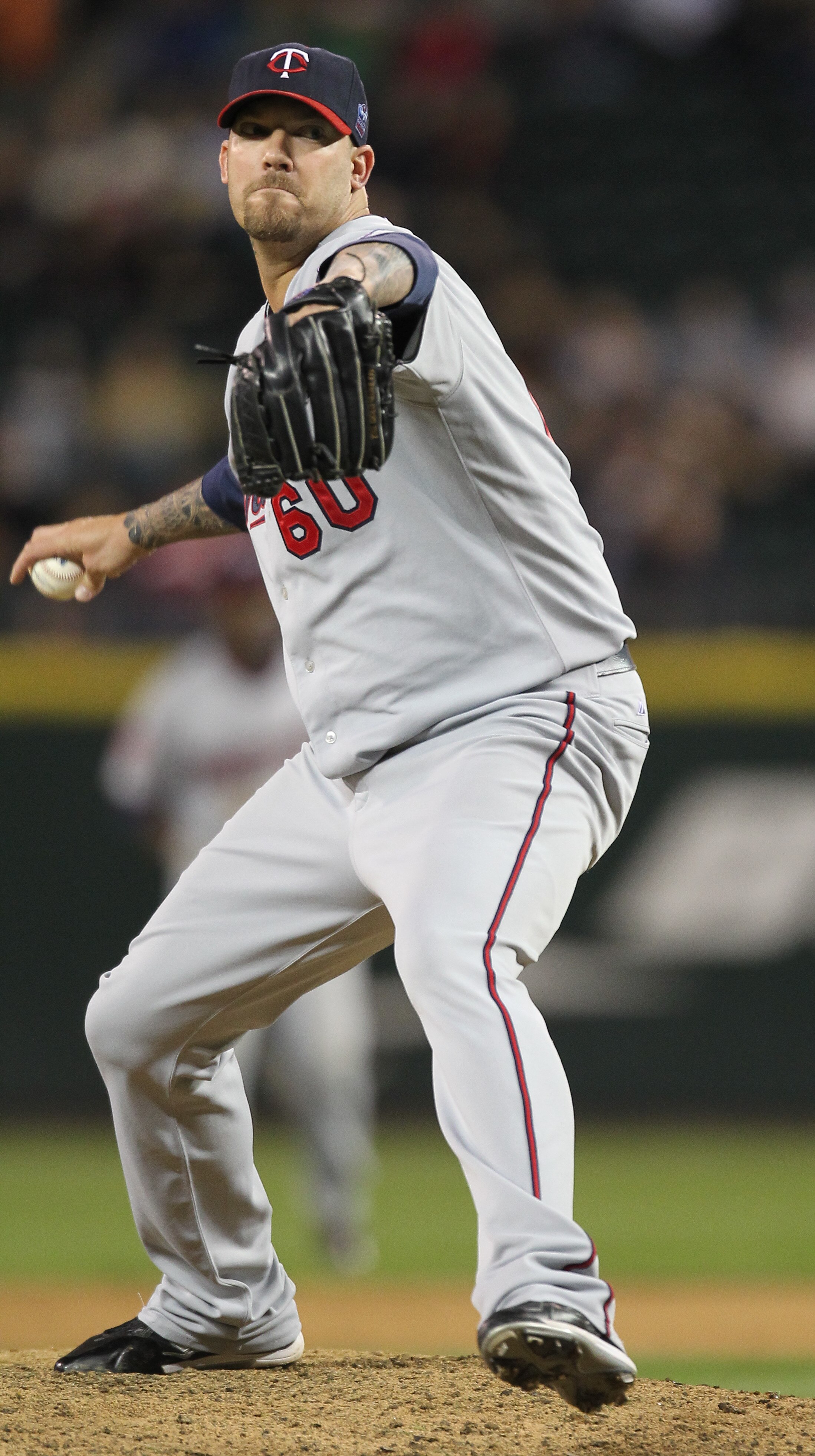 SEATTLE - AUGUST 27:  Relief pitcher Jon Rauch #60 of the Minnesota Twins pitches against the Seattle Mariners at Safeco Field on August 27, 2010 in Seattle, Washington. The Twins won 6-3. (Photo by Otto Greule Jr/Getty Images)