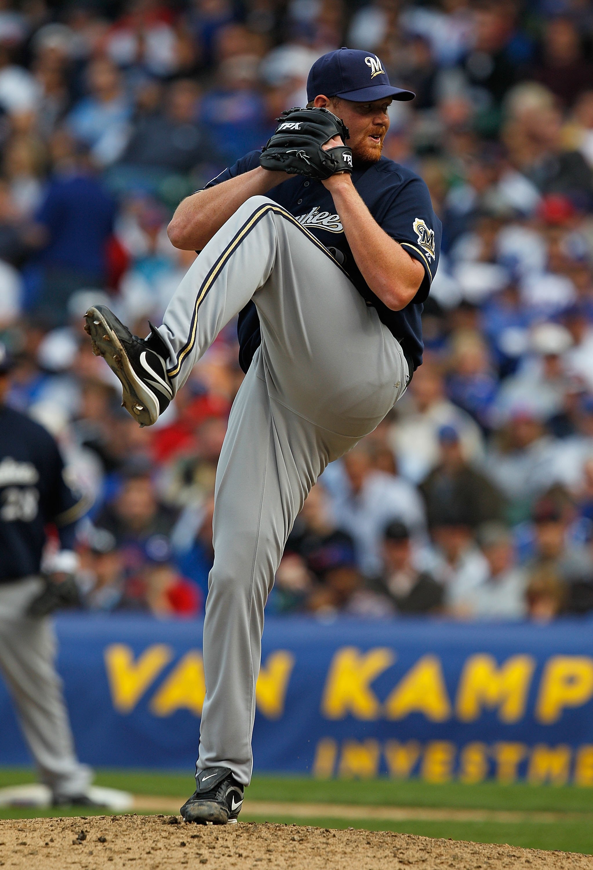 CHICAGO - APRIL 12: Todd Coffey #60 of the Milwaukee Brewers delivers the ball against the Chicago Cubs on Opening Day at Wrigley Field on April 12, 2010 in Chicago, Illinois. The Cubs defeated the Brewers 9-5. (Photo by Jonathan Daniel/Getty Images)