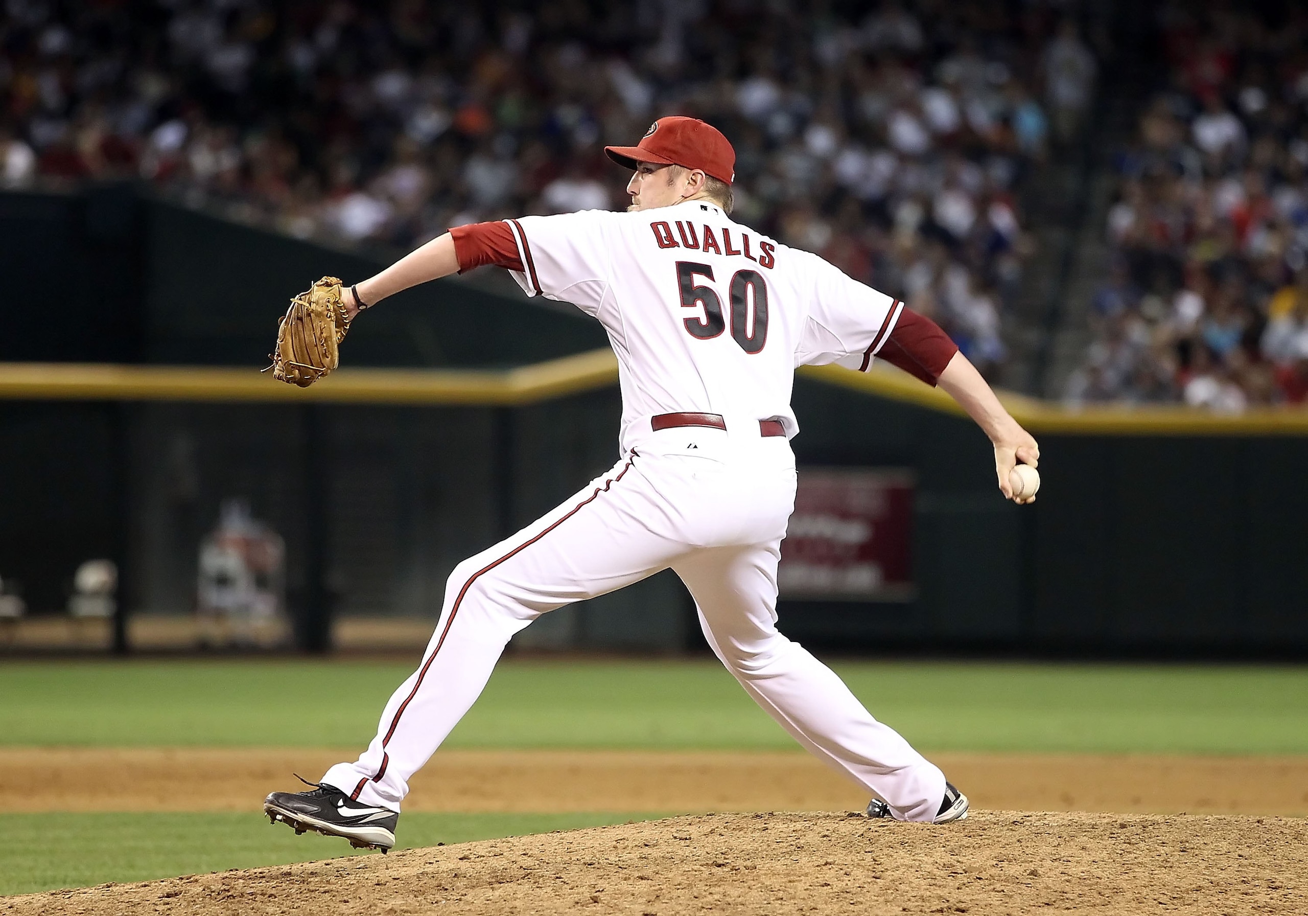 PHOENIX - JUNE 22:  Relief pitcher Chad Qualls #50 of the Arizona Diamondbacks pitches against the New York Yankees during the Major League Baseball game at Chase Field on June 22, 2010 in Phoenix, Arizona. The Yankees defeated the Diamondbacks 9-3.  (Pho