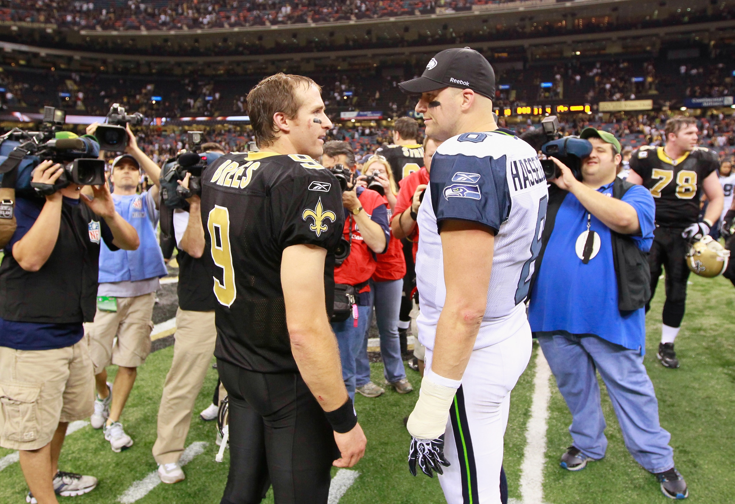 NEW ORLEANS - NOVEMBER 21: Quarterback Matt Hasselbeck #8 of the Seattle Seahawks converses with quarterback Drew Brees #9 of the New Orleans Saints after the Saints 34-19 win at Louisiana Superdome on November 21, 2010 in New Orleans, Louisiana. (Photo NEW ORLEANS - NOVEMBER 21: Quarterback Matt Hasselbeck #8 of the Seattle Seahawks converses with quarterback Drew Brees #9 of the New Orleans Saints after the Saints 34-19 win at Louisiana Superdome on November 21, 2010 in New Orleans, Louisiana. (Photo