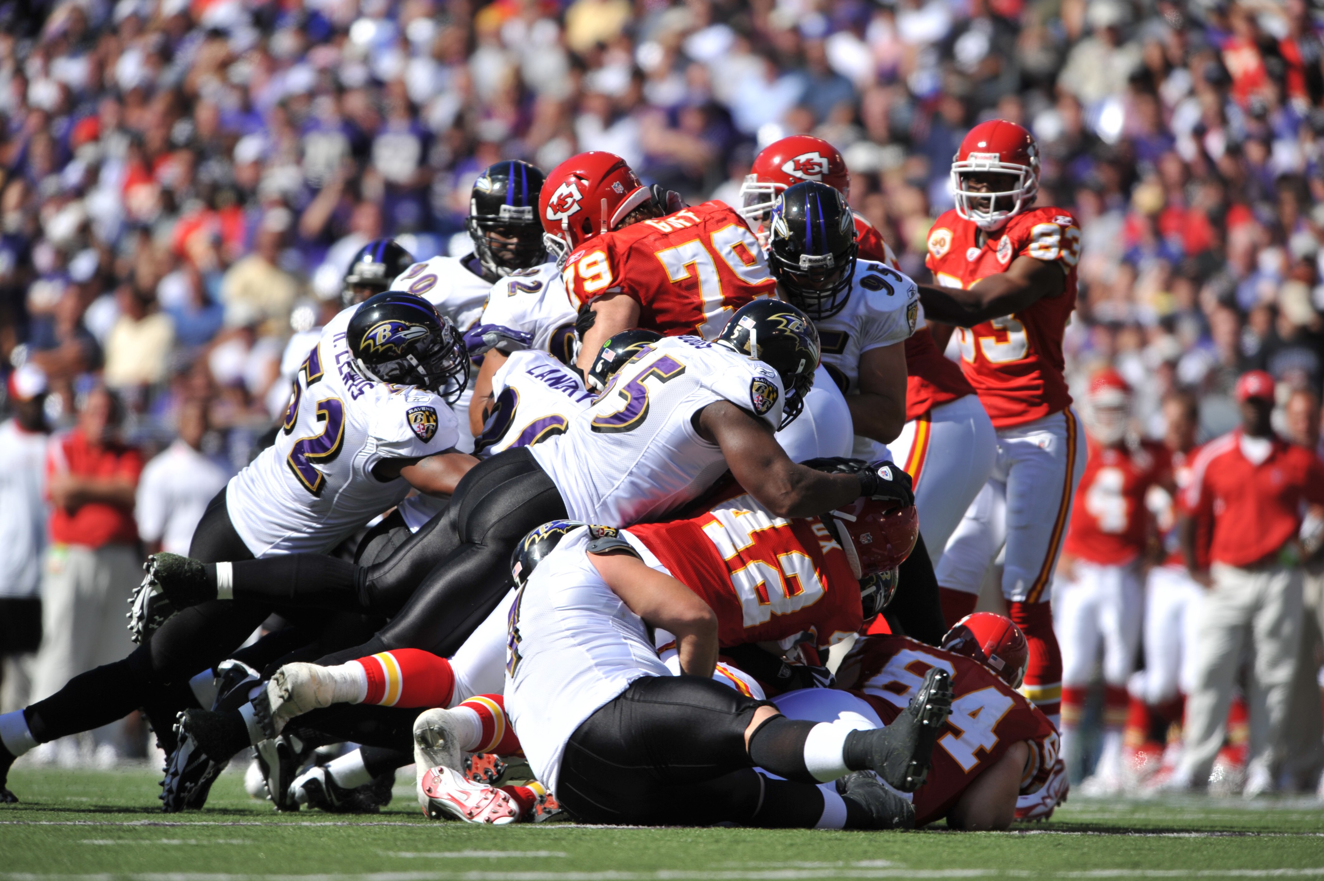 BALTIMORE - SEPTEMBER 13:  The Baltimore Ravens defense led by Ray Lewis #52 swarms Mike Goff #79 of the Kansas City Chiefs at M&T Bank Stadium on September 13, 2009 in Baltimore, Maryland. The Ravens defeated the Chiefs 38-24. (Photo by Larry French/Gett