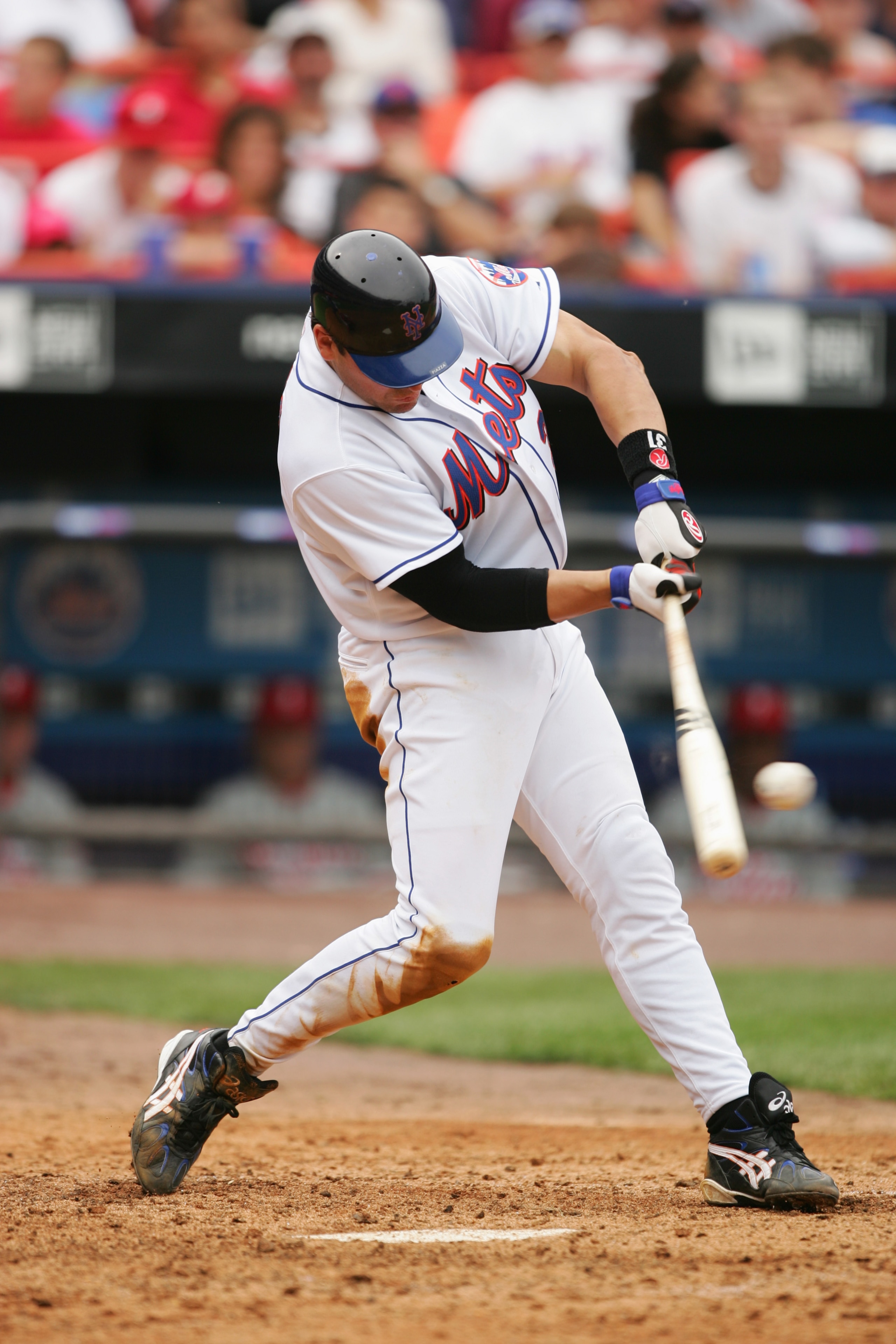 FLUSHING, NY - JUNE 30: Mike Piazza #31 of the New York Mets grounds into a force out (third base to second base) against the Philadelphia Phillies in the seventh inning of the game on June 30, 2005 at Shea Stadium in Flushing, New York. The Mets won 5- FLUSHING, NY - JUNE 30: Mike Piazza #31 of the New York Mets grounds into a force out (third base to second base) against the Philadelphia Phillies in the seventh inning of the game on June 30, 2005 at Shea Stadium in Flushing, New York. The Mets won 5-