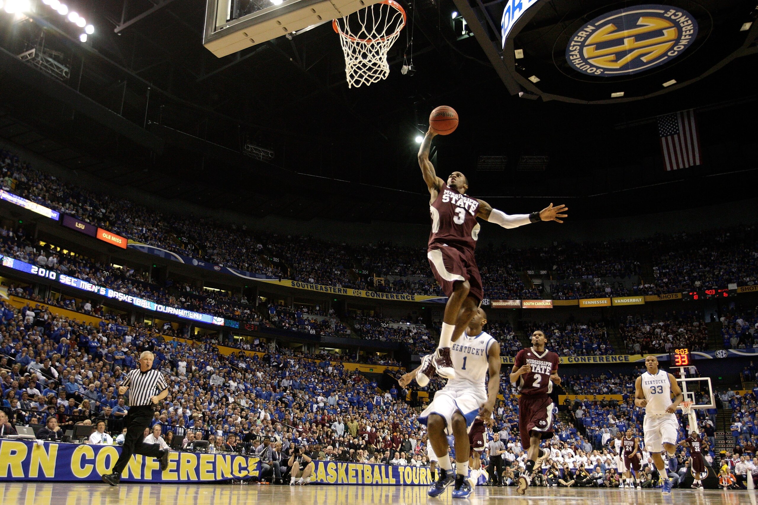 NASHVILLE, TN - MARCH 14:  Dee Bost #3 of the Mississippi State Bulldogs dunks against the Kentucky Wildcats during the final of the SEC Men's Basketball Tournament at the Bridgestone Arena on March 14, 2010 in Nashville, Tennessee. Kentucky won 75-74 in