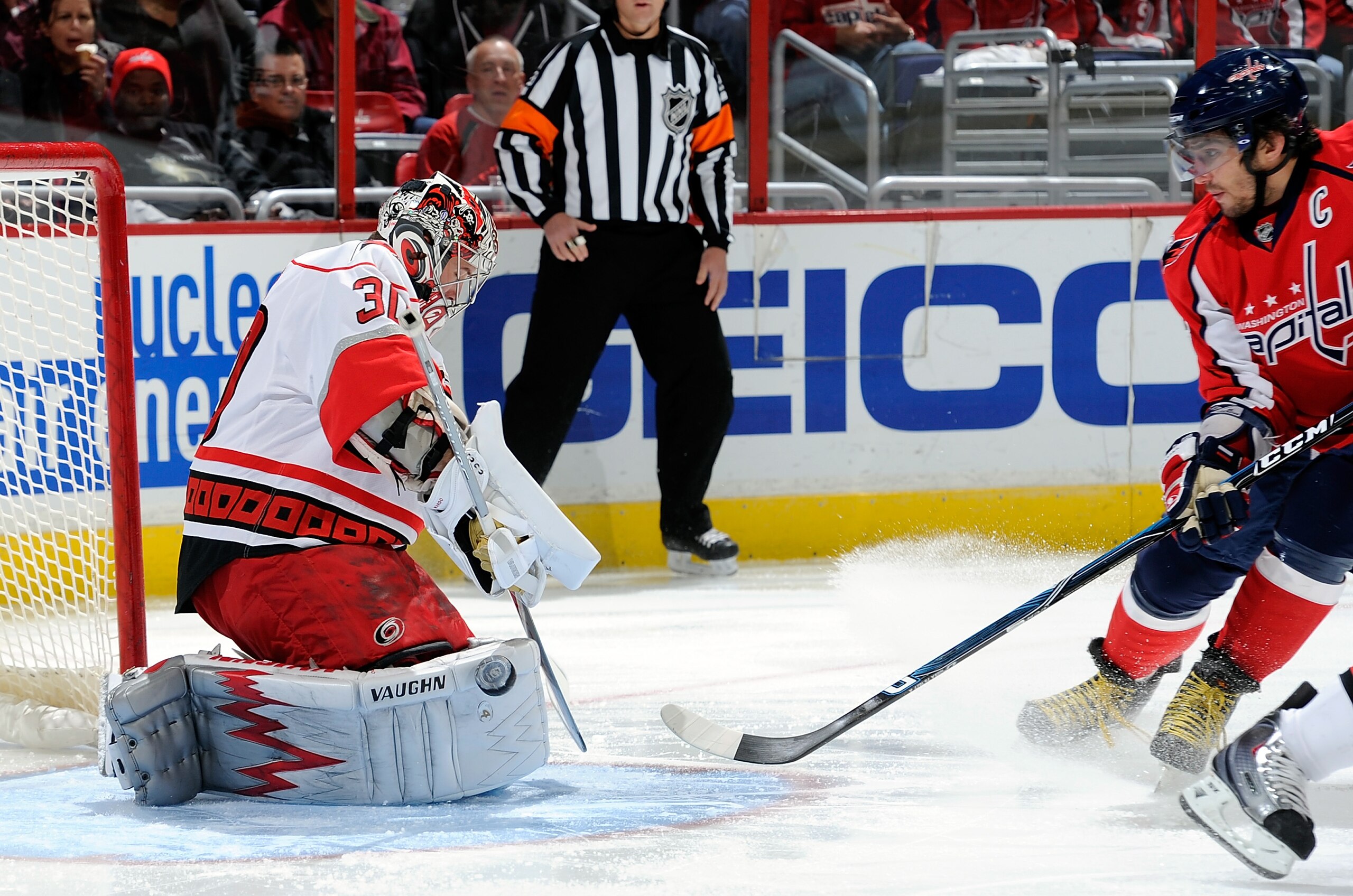WASHINGTON - NOVEMBER 28: Cam Ward #30 of the Carolina Hurricanes makes a save against Alex Ovechkin #8 of the Washington Capitals at the Verizon Center on November 28, 2010 in Washington, DC. (Photo by Greg Fiume/Getty Images) WASHINGTON - NOVEMBER 28: Cam Ward #30 of the Carolina Hurricanes makes a save against Alex Ovechkin #8 of the Washington Capitals at the Verizon Center on November 28, 2010 in Washington, DC. (Photo by Greg Fiume/Getty Images)