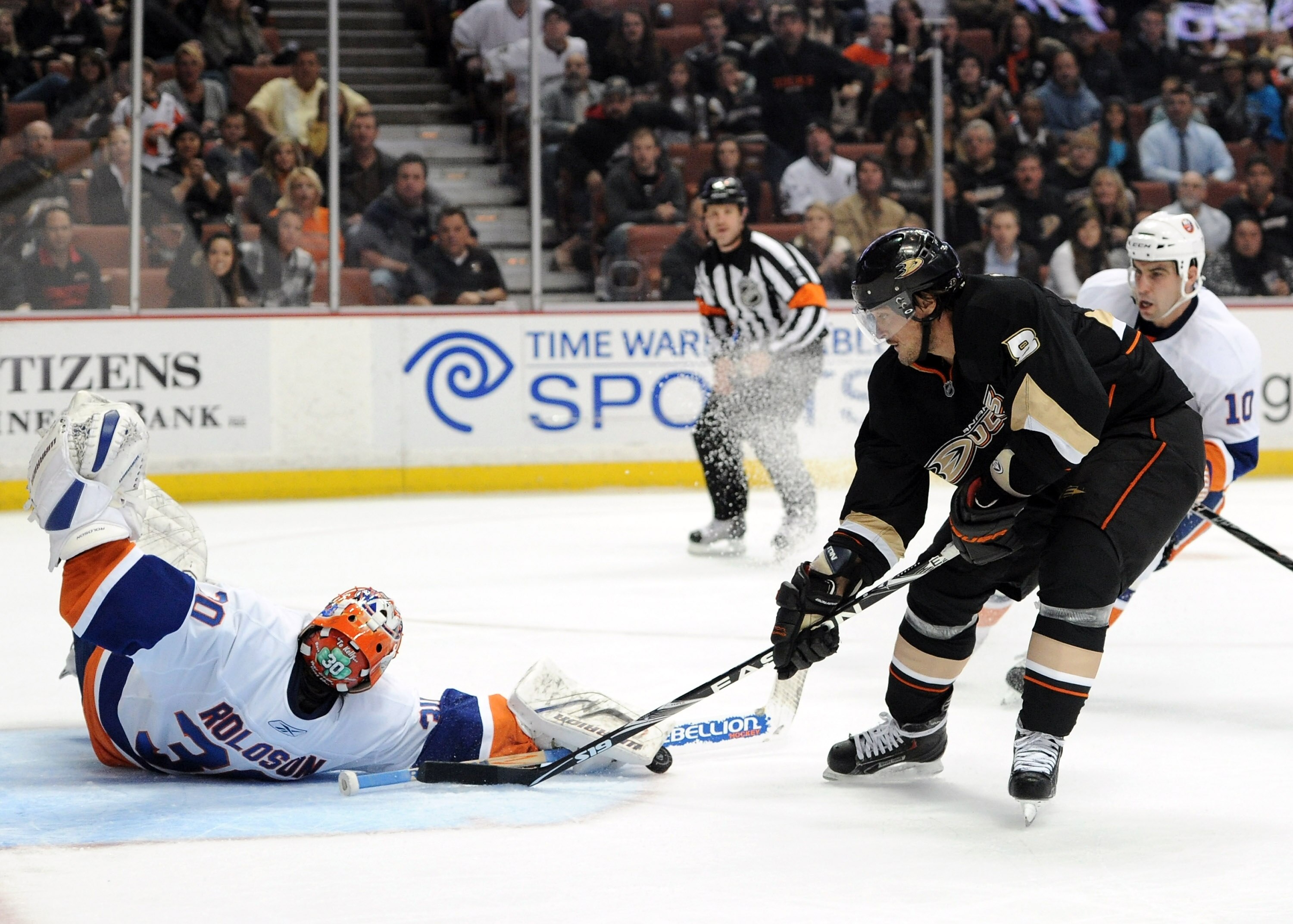 ANAHEIM, CA - NOVEMBER 10:  Teemu Selanne #8 of the Anaheim Ducks is stopped on a breakaway by Dwayne Roloson #30 of the New York Islanders during the third period at the Honda Center on November 10, 2010 in Anaheim, California.  (Photo by Harry How/Getty