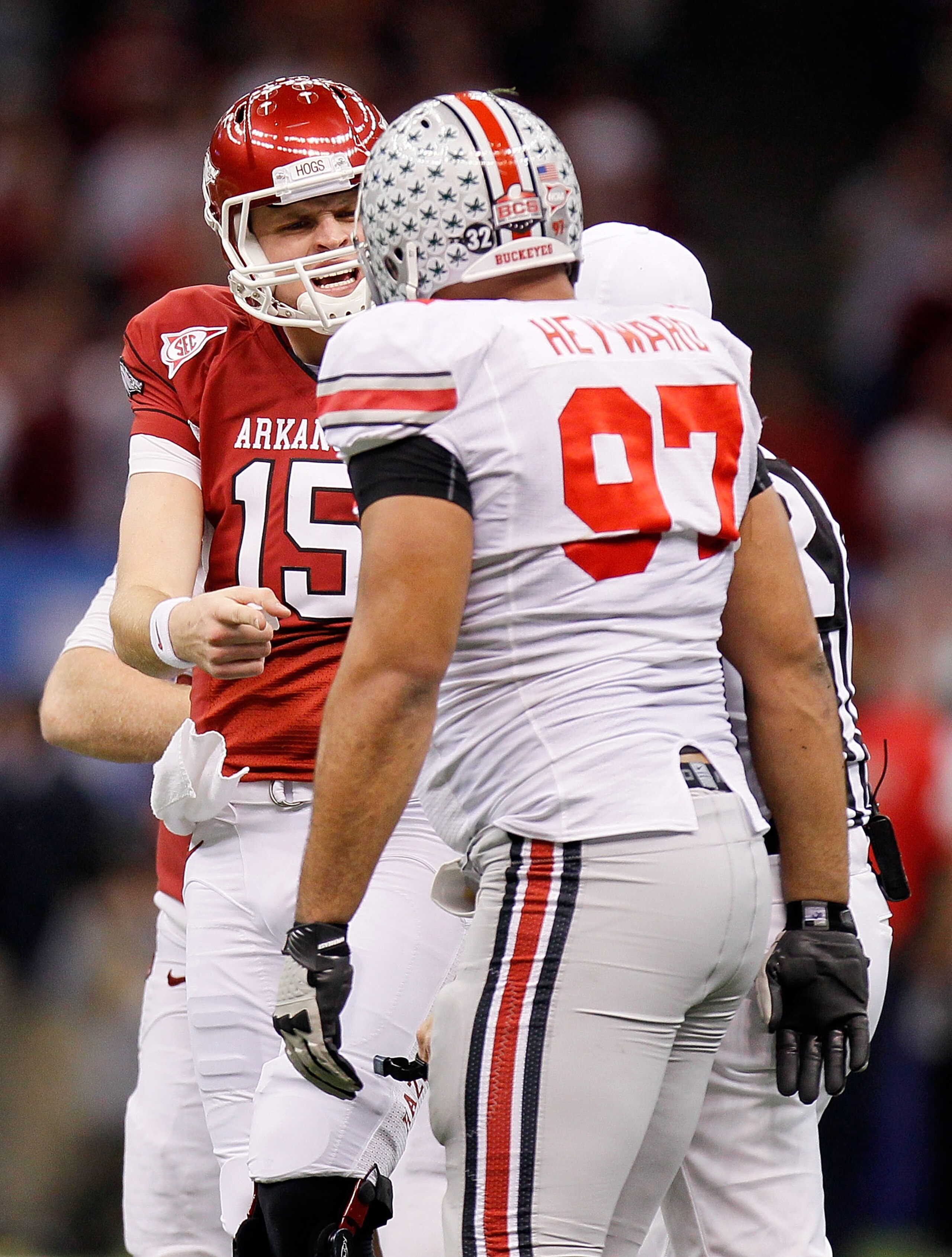 NEW ORLEANS, LA - JANUARY 04:  Ryan Mallett #15 of the Arkansas Razorbacks exchanges words with Cameron Heyward #97 of the Ohio State Buckeyes in the second quarter during the Allstate Sugar Bowl at the Louisiana Superdome on January 4, 2011 in New Orlean