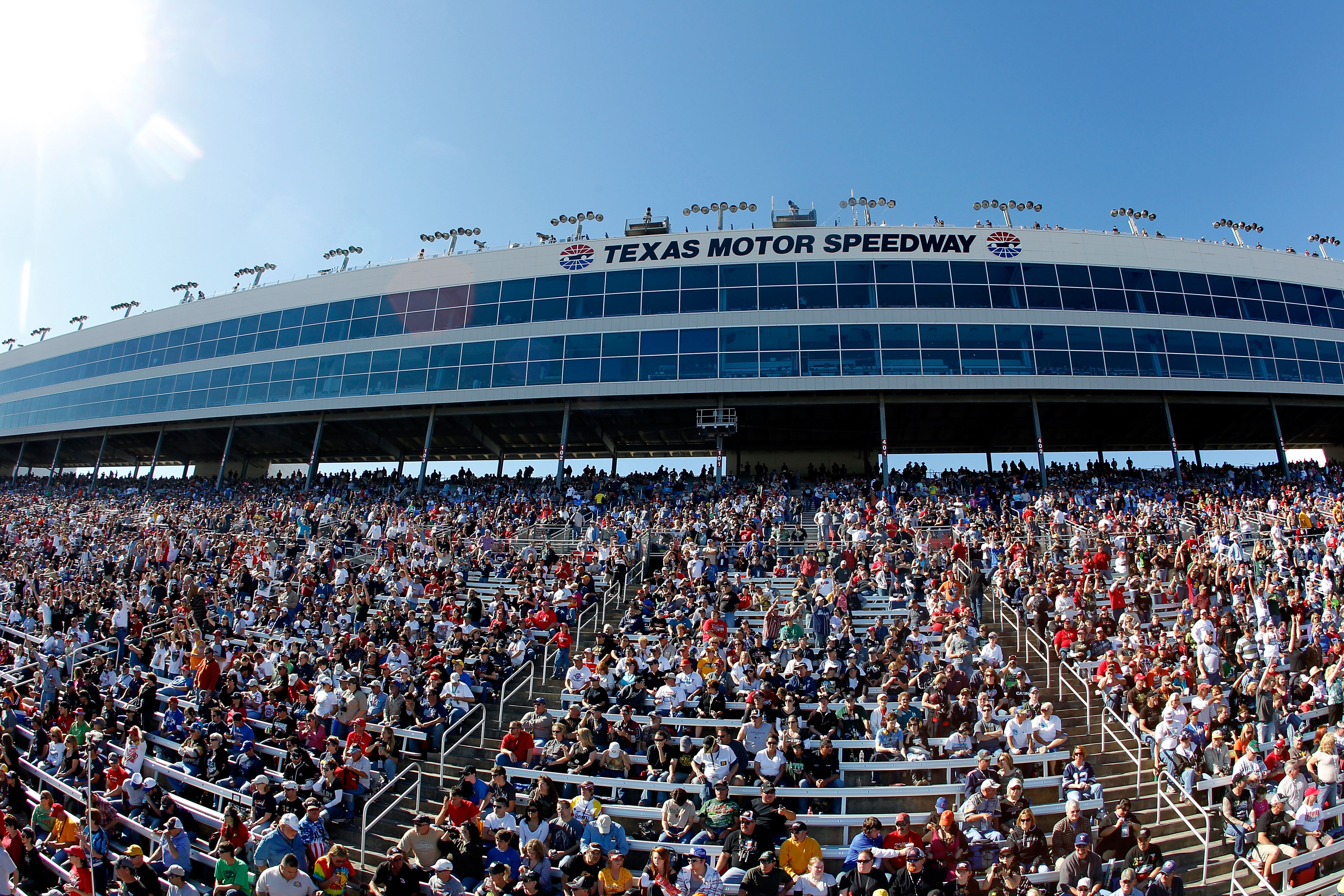 FORT WORTH, TX - NOVEMBER 07:  Fans watch pre-race ceremonies prior to the NASCAR Sprint Cup Series AAA Texas 500 at Texas Motor Speedway on November 7, 2010 in Fort Worth, Texas.  (Photo by Todd Warshaw/Getty Images)