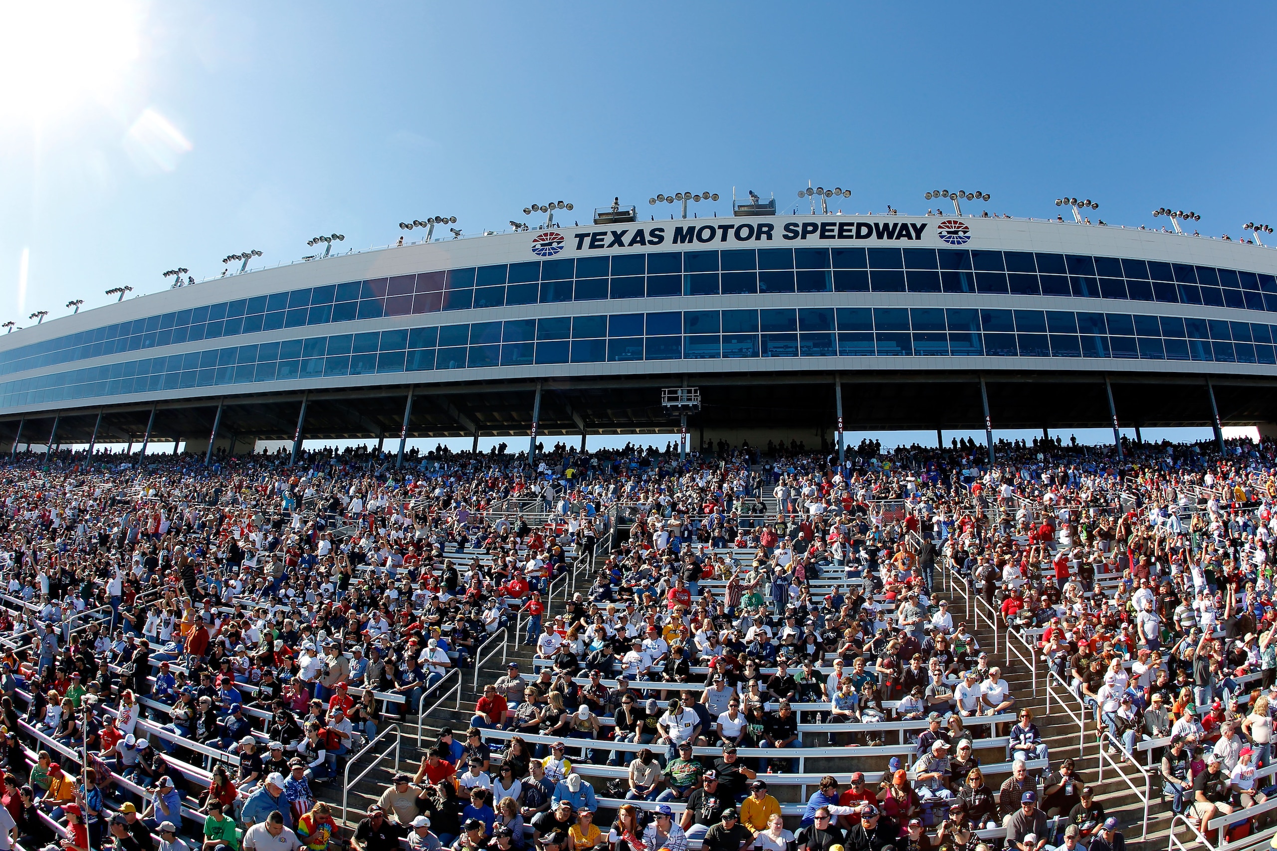 FORT WORTH, TX - NOVEMBER 07:  Fans watch pre-race ceremonies prior to the NASCAR Sprint Cup Series AAA Texas 500 at Texas Motor Speedway on November 7, 2010 in Fort Worth, Texas.  (Photo by Todd Warshaw/Getty Images)