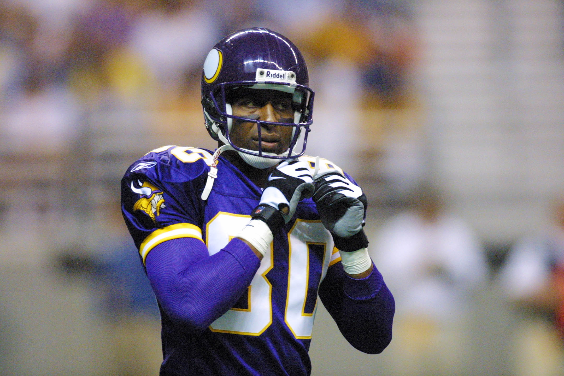 11 Aug 2001: Cris Carter of the Minnesota Vikings adjusts his helmet during the pre-season game against the New Orleans Saints at the Alamo Dome in San Antonio, Texas. The Vikings defeated the Saints 28-21. DIGITAL IMAGE . Mandatory Credit: Ronald Martine