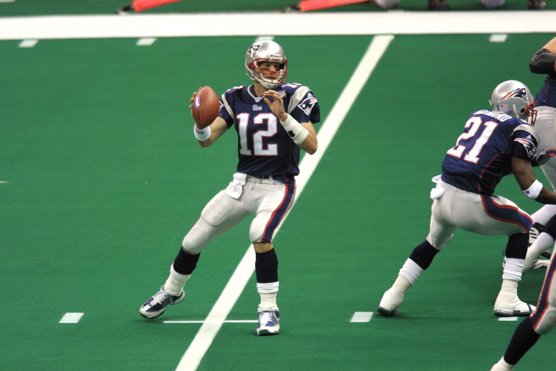 03 Feb 2002:  Quarterback Tom Brady #12 of the New England Patriots looks to throw a pass against the St.Louis Rams  during Superbowl XXXVI at the Superdome in New Orleans, Louisiana.  The Patriots defeated the Rams 20-17. DIGITAL IMAGE. Mandatory Credit:
