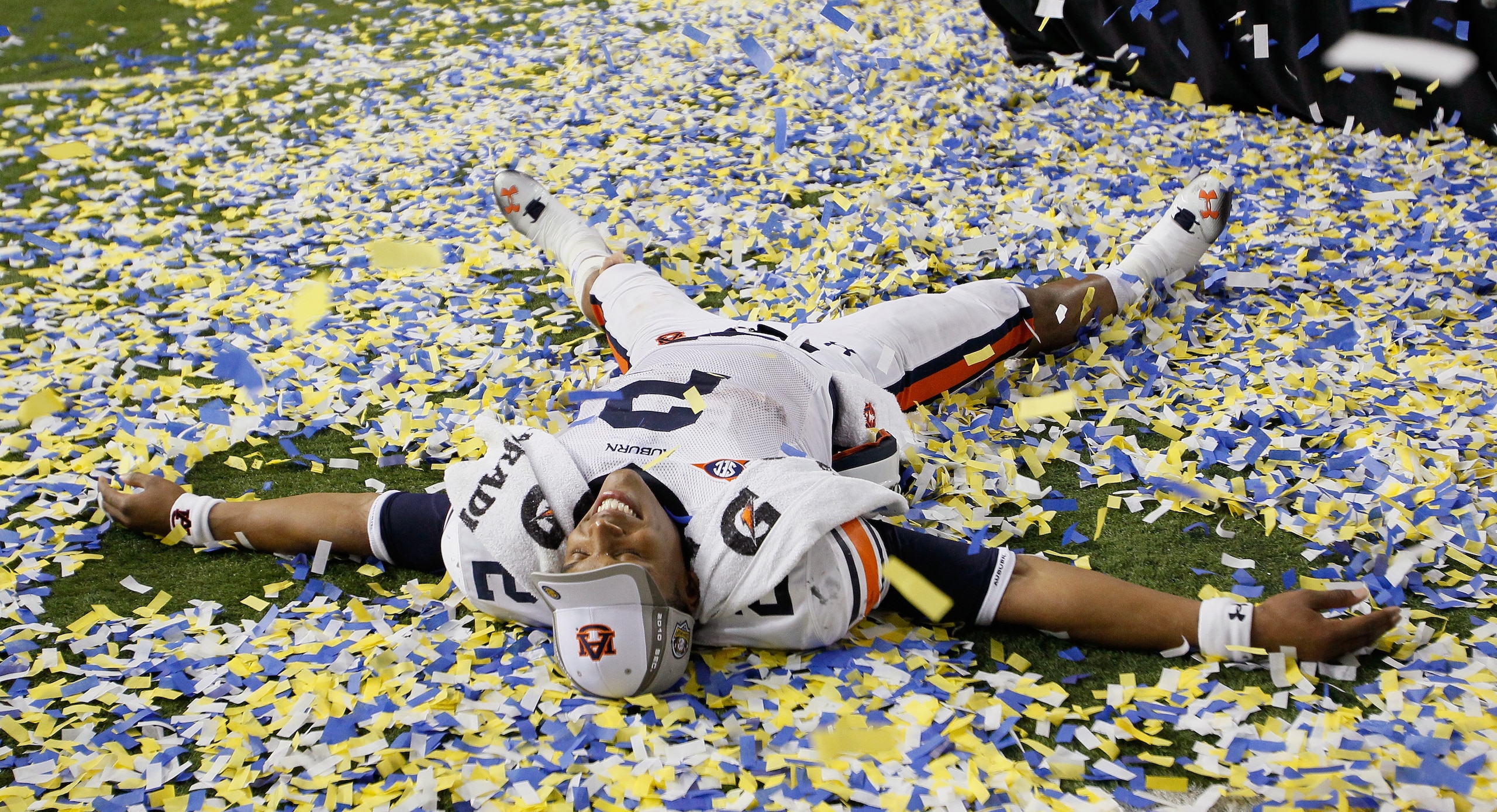 ATLANTA, GA - DECEMBER 04:  Quarterback Cam Newton #2 of the Auburn Tigers celebrates after their 56-17 win over the South Carolina Gamecocks during the 2010 SEC Championship at Georgia Dome on December 4, 2010 in Atlanta, Georgia.  (Photo by Kevin C. Cox