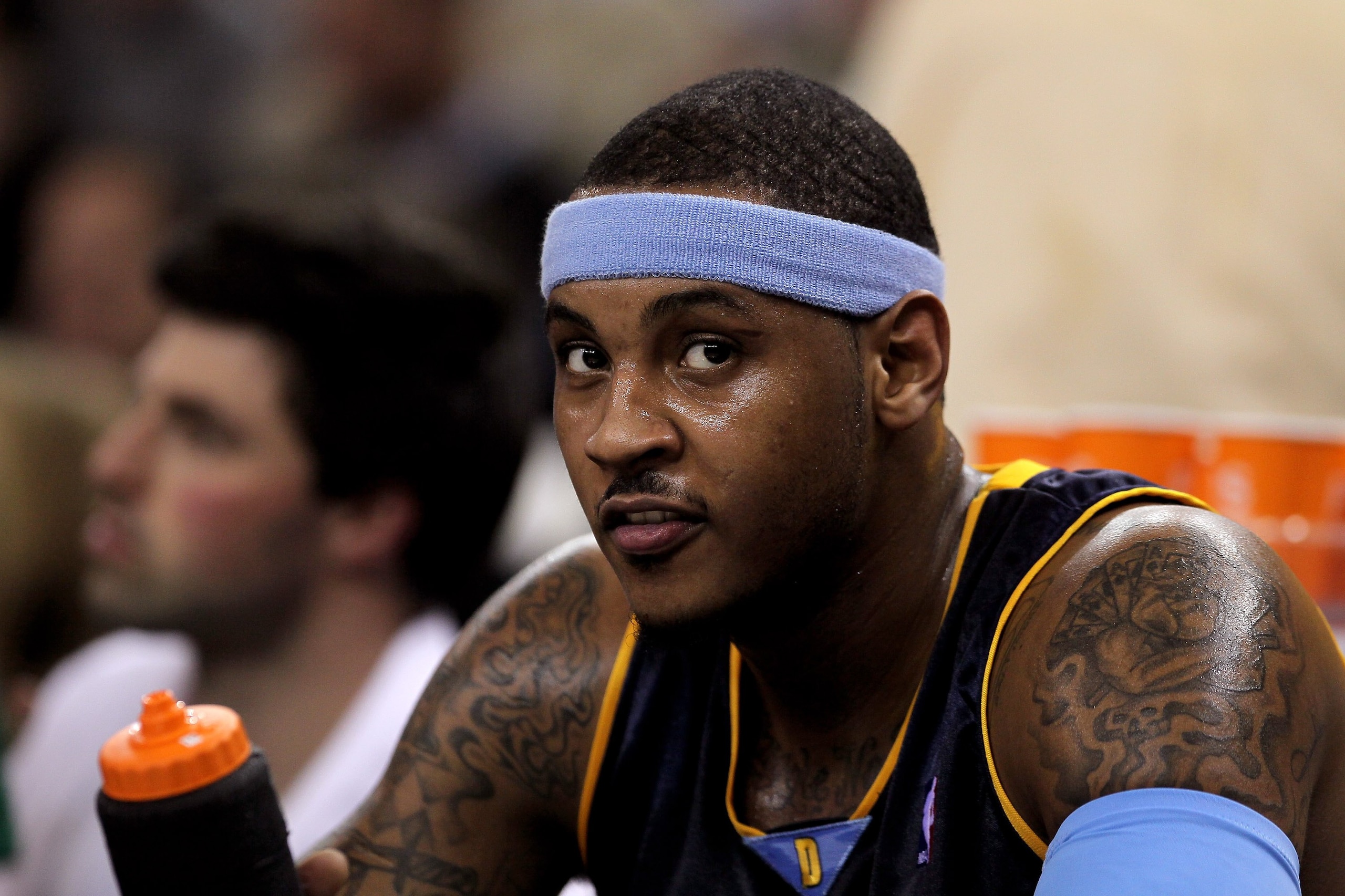 OAKLAND, CA - JANUARY 20:  Carmelo Anthony #15 of the Denver Nuggets sits on the bench during their game against the Golden State Warriors at Oracle Arena on January 20, 2010 in Oakland, California.  NOTE TO USER: User expressly acknowledges and agrees th
