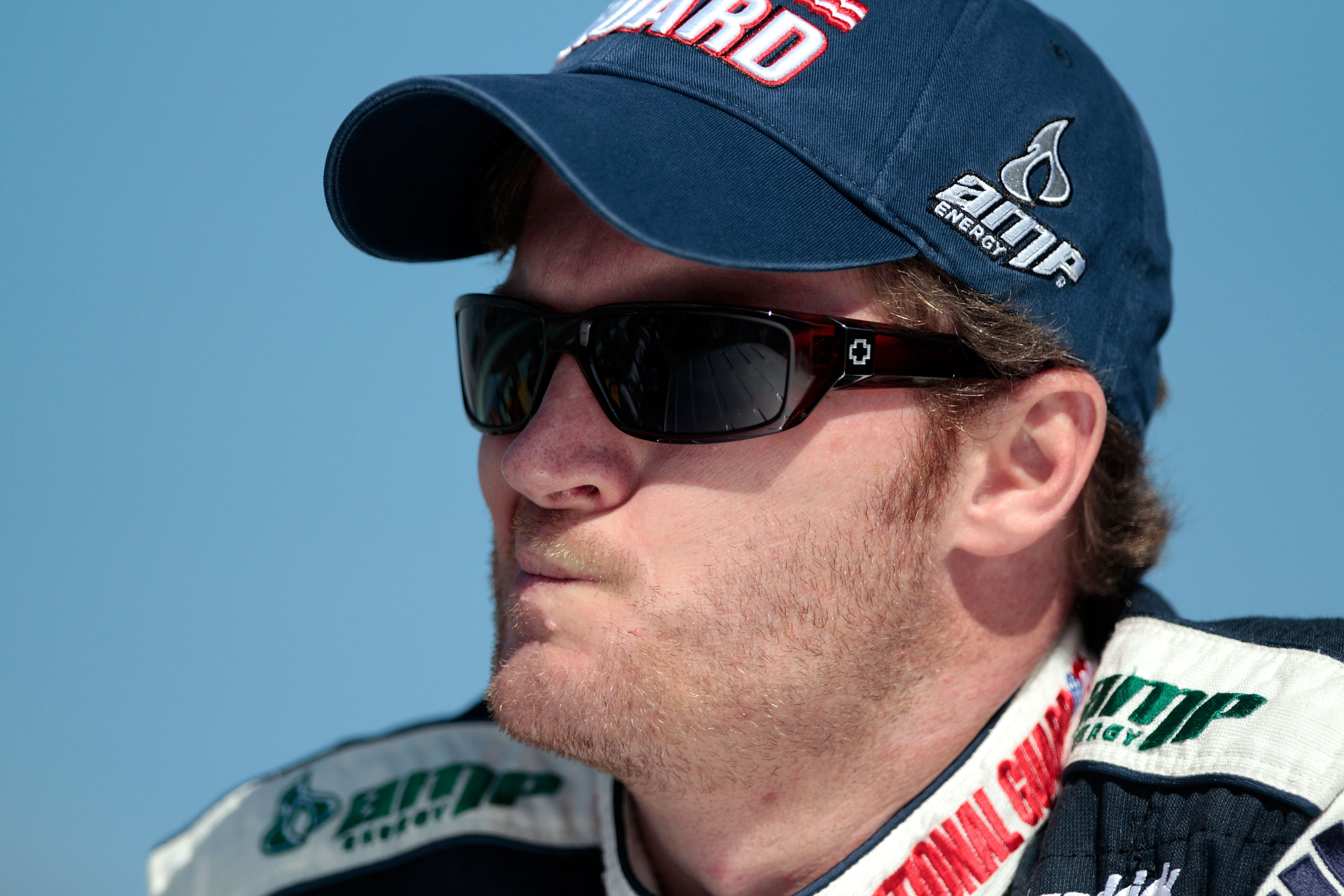 HOMESTEAD, FL - NOVEMBER 21:  Dale Earnhardt Jr., driver of the #88 National Guard/AMP Energy Chevrolet, stands on pit road prior to the NASCAR Sprint Cup Series Ford 400 at Homestead-Miami Speedway on November 21, 2010 in Homestead, Florida.  (Photo by C