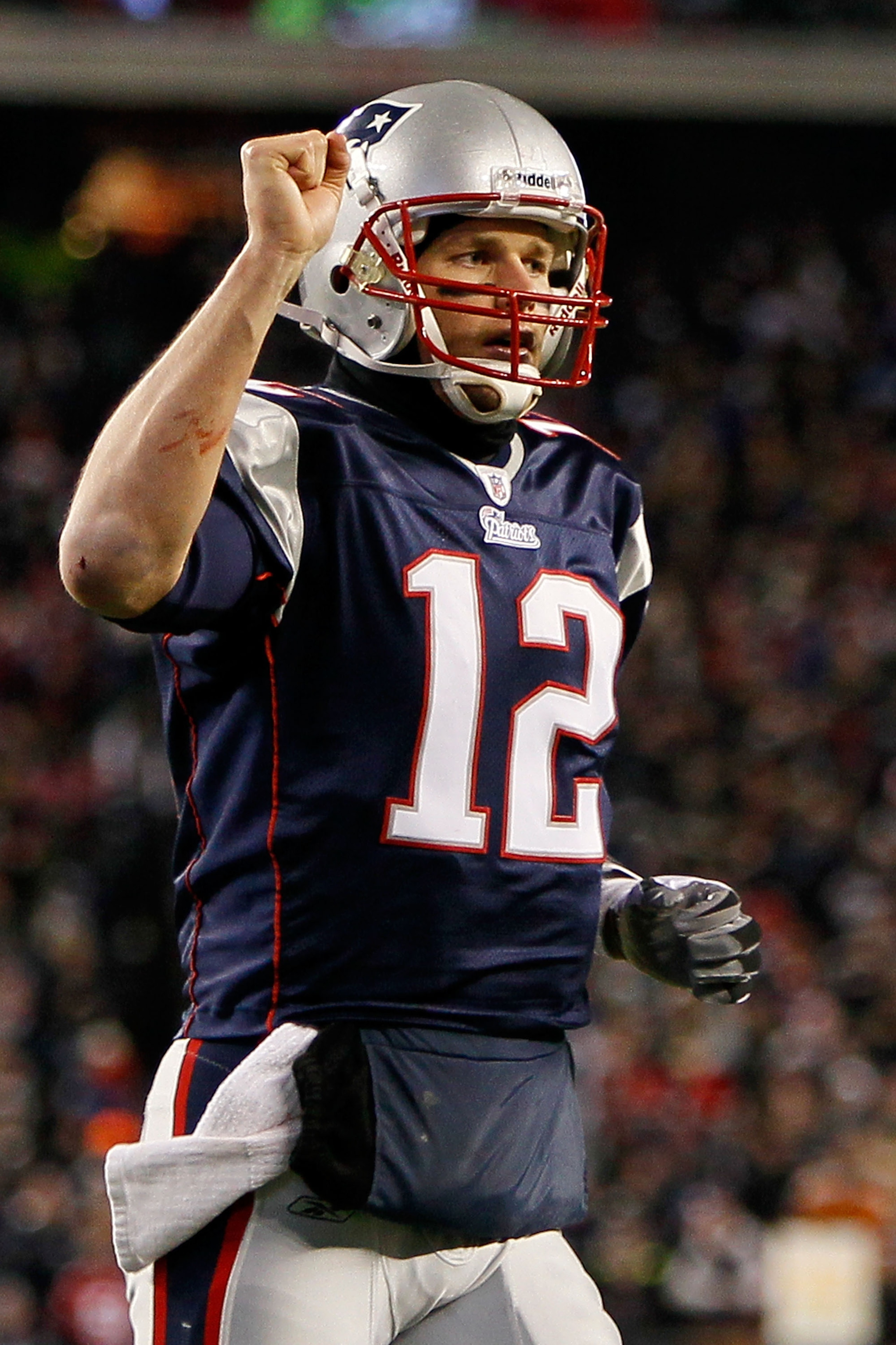 FOXBORO, MA - DECEMBER 06: Tom Brady #12 of the New England Patriots reacts after Brandon Tate #19 scored a 4-yard touchdown reception in the second quarter against the New York Jets at Gillette Stadium on December 6, 2010 in Foxboro, Massachusetts. (Ph FOXBORO, MA - DECEMBER 06: Tom Brady #12 of the New England Patriots reacts after Brandon Tate #19 scored a 4-yard touchdown reception in the second quarter against the New York Jets at Gillette Stadium on December 6, 2010 in Foxboro, Massachusetts. (Ph