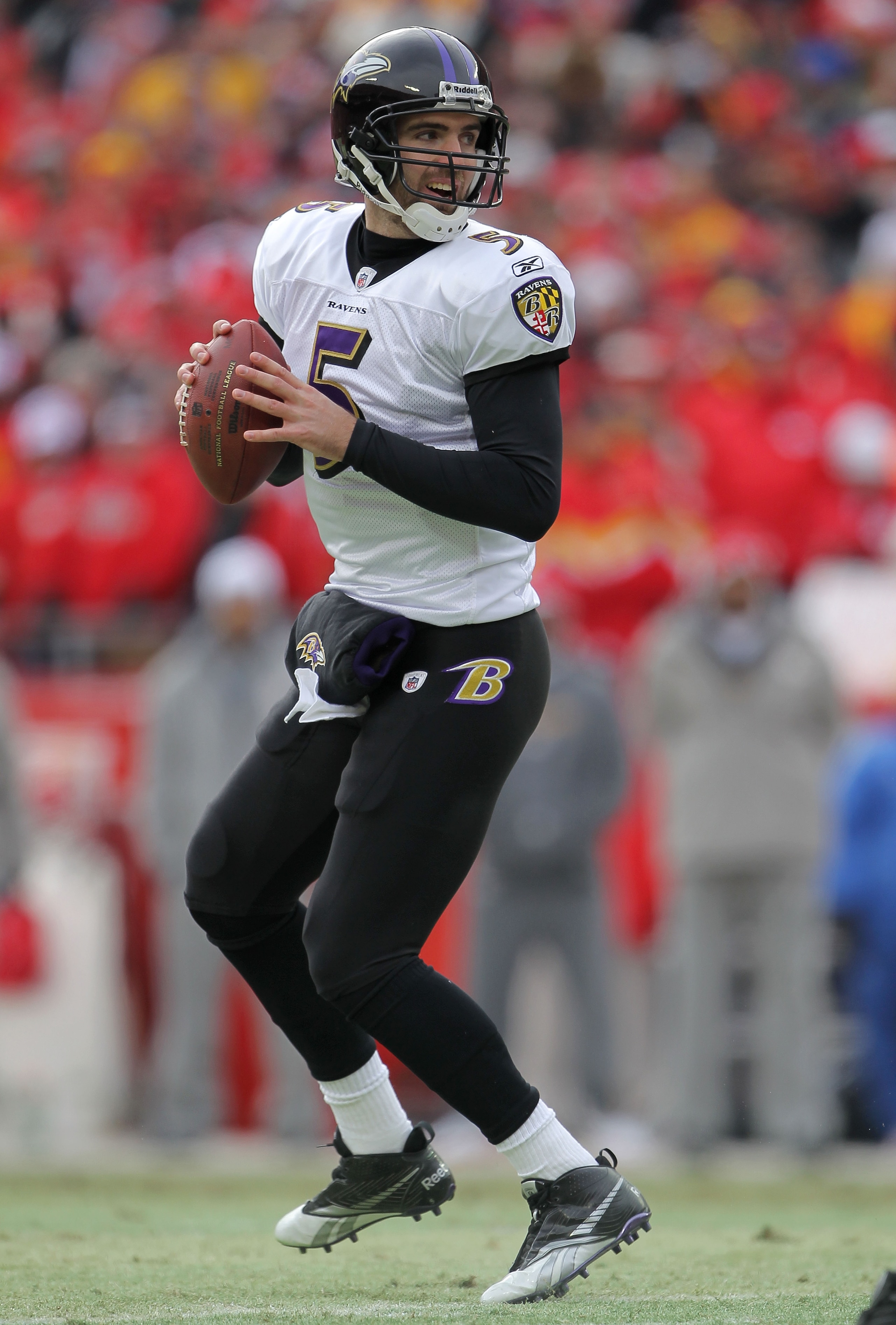 KANSAS CITY, MO - JANUARY 09: Quarterback Joe Flacco #5 of the Baltimore Ravens looks to pass against the Kansas City Chiefs in their 2011 AFC wild card playoff game at Arrowhead Stadium on January 9, 2011 in Kansas City, Missouri. (Photo by Doug Pensin KANSAS CITY, MO - JANUARY 09: Quarterback Joe Flacco #5 of the Baltimore Ravens looks to pass against the Kansas City Chiefs in their 2011 AFC wild card playoff game at Arrowhead Stadium on January 9, 2011 in Kansas City, Missouri. (Photo by Doug Pensin