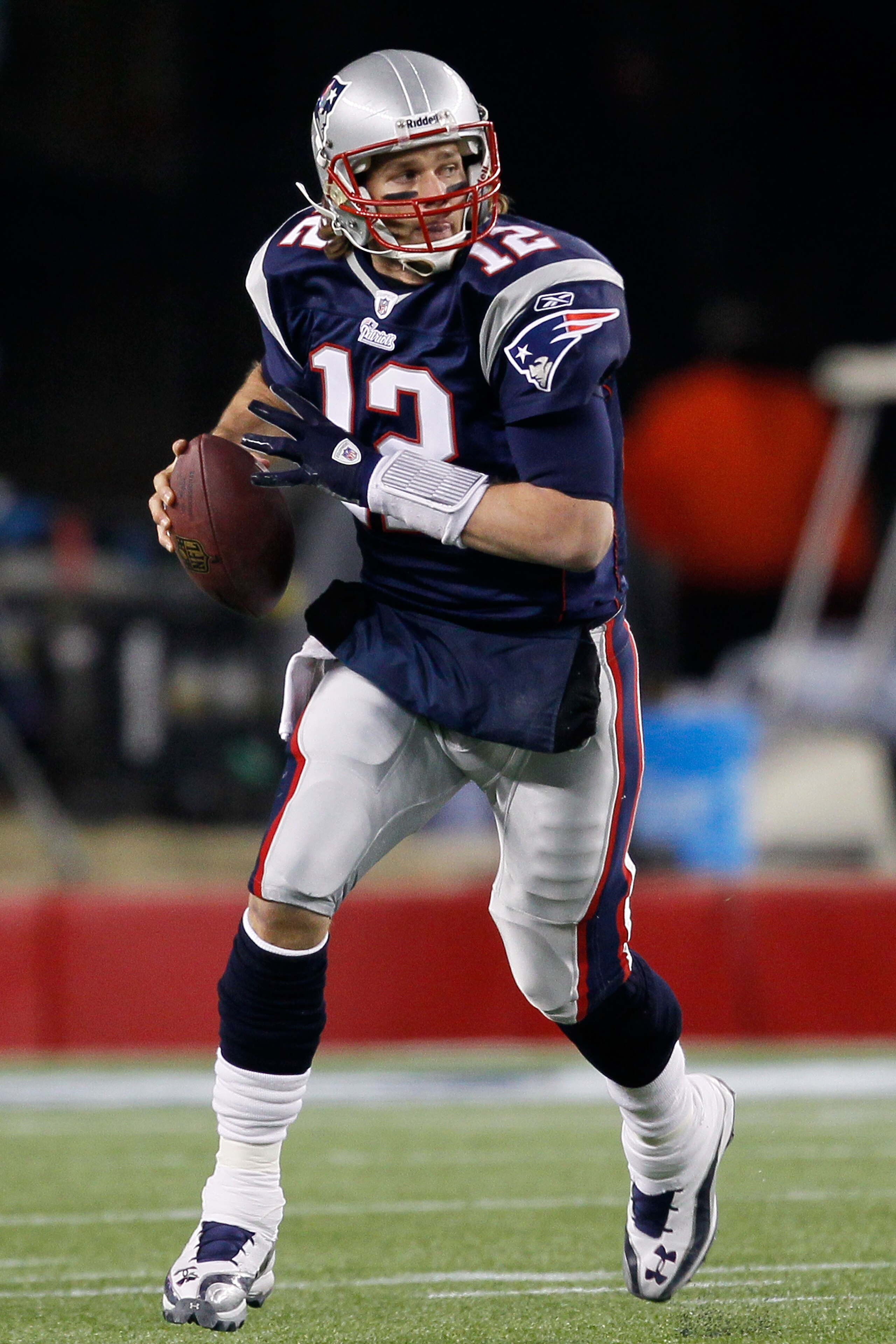FOXBORO, MA - DECEMBER 19: Quarterback Tom Brady #12 of the New England Patriots looks to pass against the Green Bay Packers in the second quarter of the game at Gillette Stadium on December 19, 2010 in Foxboro, Massachusetts. The Patriots won the game 3 FOXBORO, MA - DECEMBER 19: Quarterback Tom Brady #12 of the New England Patriots looks to pass against the Green Bay Packers in the second quarter of the game at Gillette Stadium on December 19, 2010 in Foxboro, Massachusetts. The Patriots won the game 3