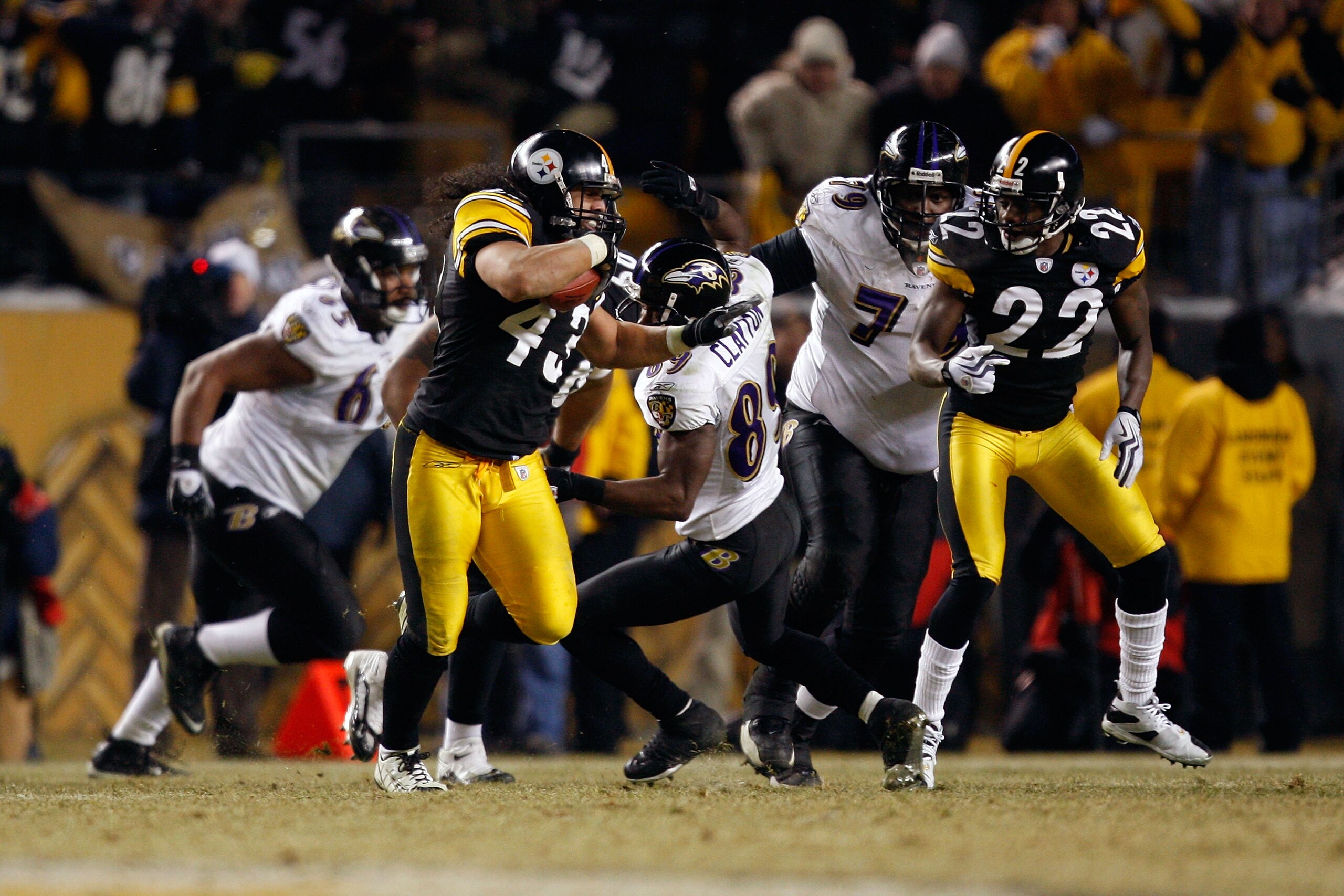 PITTSBURGH - JANUARY 18:  Troy Polamalu #43 of the Pittsburgh Steelers returns an interception 40-yards for a touchdown against the Baltimore Ravens during the AFC Championship game on January 18, 2009 at Heinz Field in Pittsburgh, Pennsylvania. Steelers