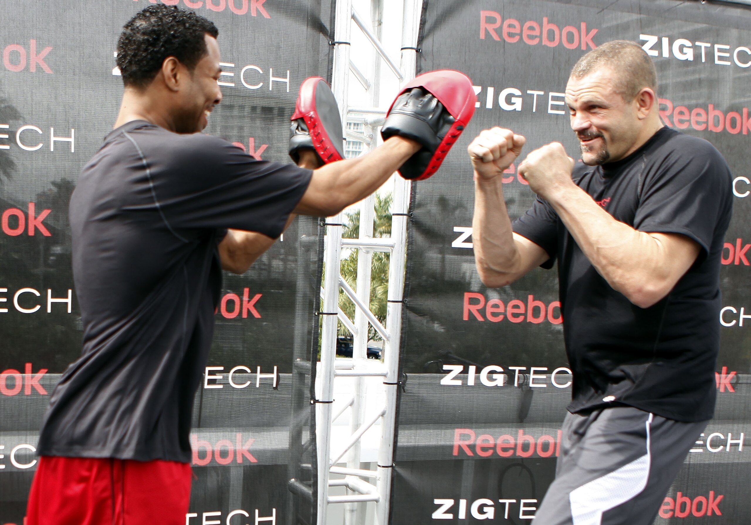 FORT LAUDERDALE, FL - FEBRUARY 05:  Fighter 'Sugar' Shane Mosley (L) and MMA fighter Chuck Liddell (R) spar during the Reebok launch of the ZIGTECH shoe on February 5, 2010 in Fort Lauderdale, Florida.  (Photo by Marc Serota/Getty Images for Reebok)