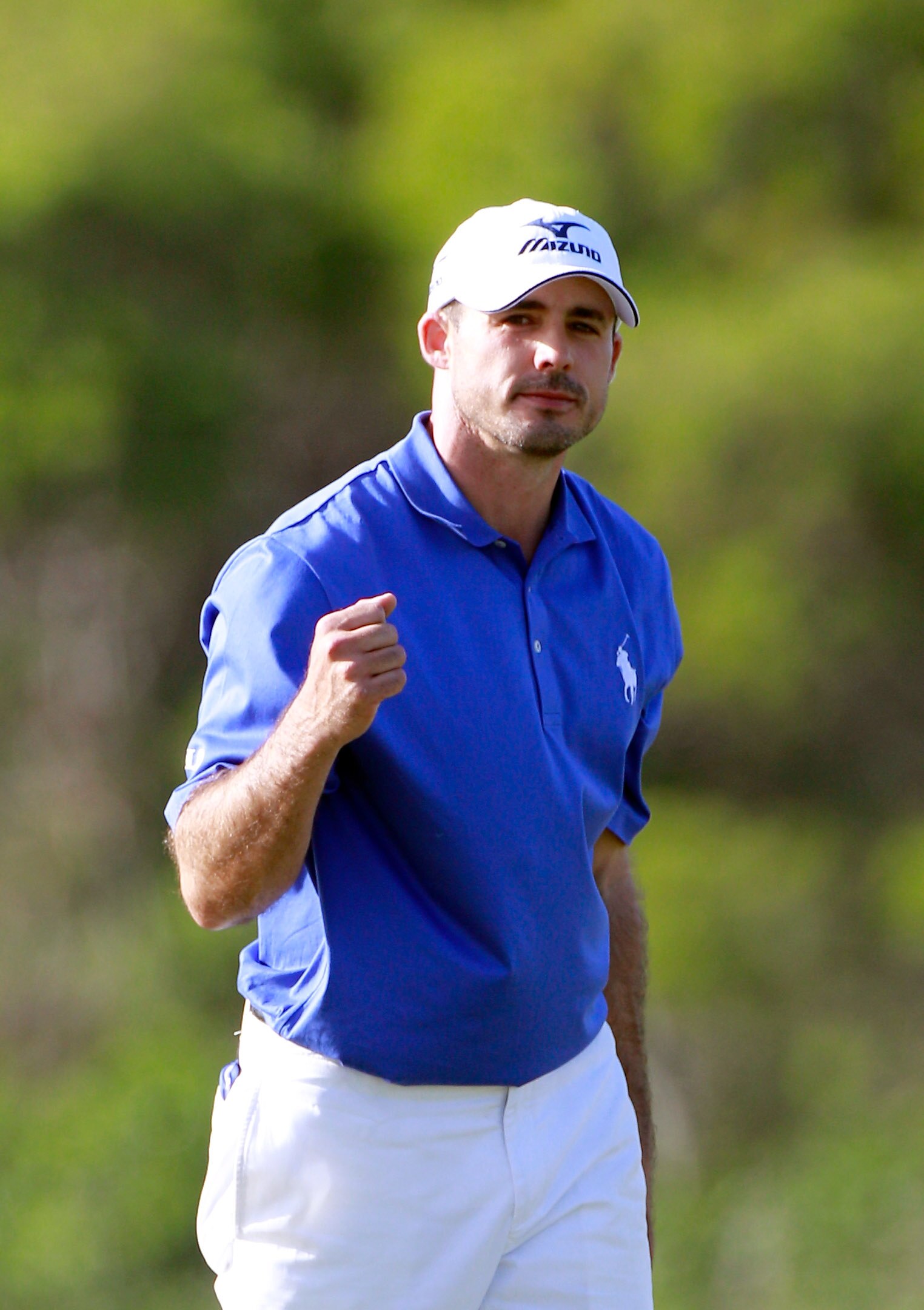 KAPALUA, HI - JANUARY 08:  Jonathan Byrd reacts to a birdie putt on the 13th hole during the third round of the Hyundai Tournament of Champions at the Plantation course on January 8, 2011 in Kapalua, Hawaii.  (Photo by Sam Greenwood/Getty Images)