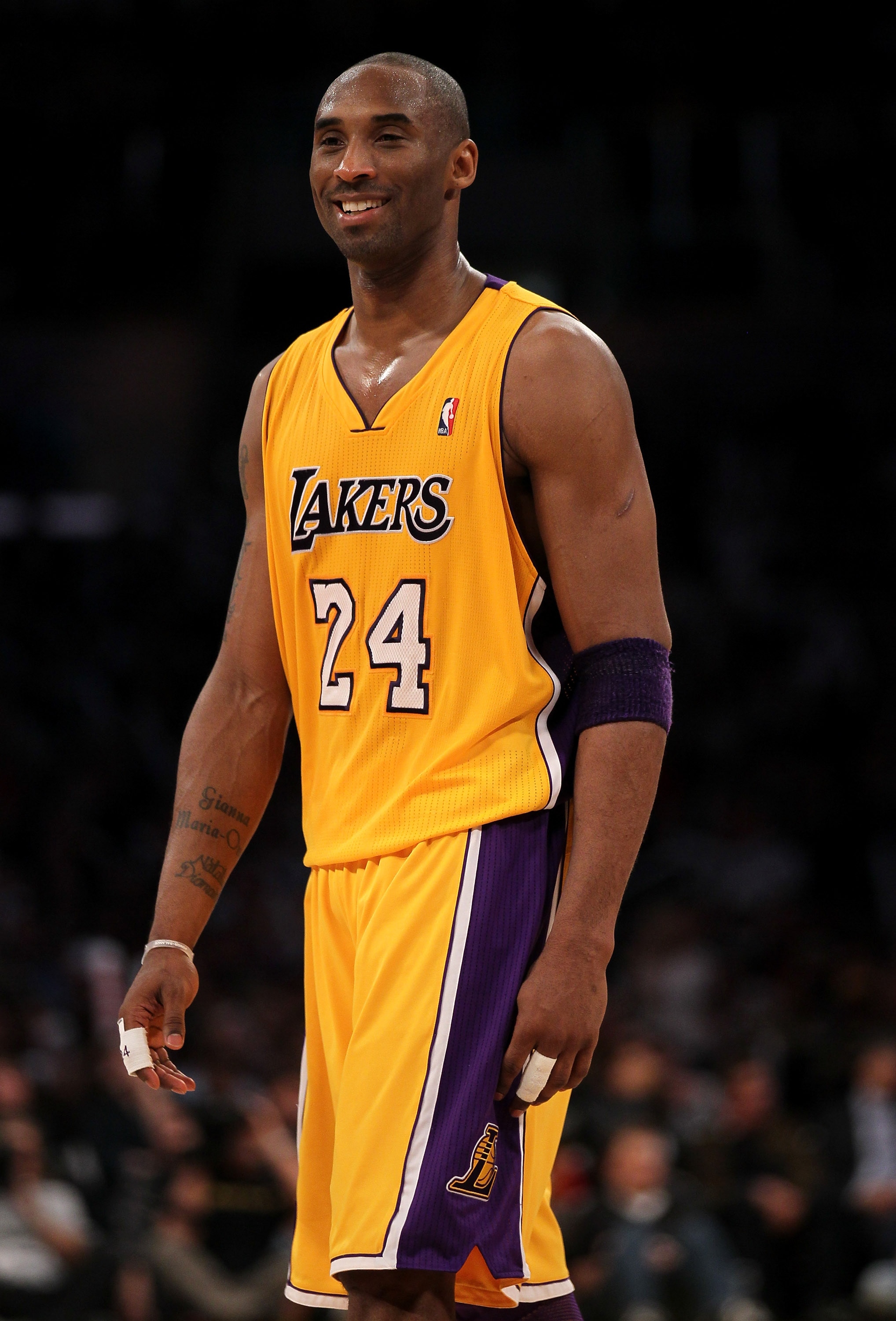 LOS ANGELES, CA - JANUARY 07:  Kobe Bryant #24 of the Los Angeles Lakers smiles during the game with the New Orleans Hornets at Staples Center on January 7, 2011 in Los Angeles, California.  The Lakers won 101-97.  NOTE TO USER: User expressly acknowledge