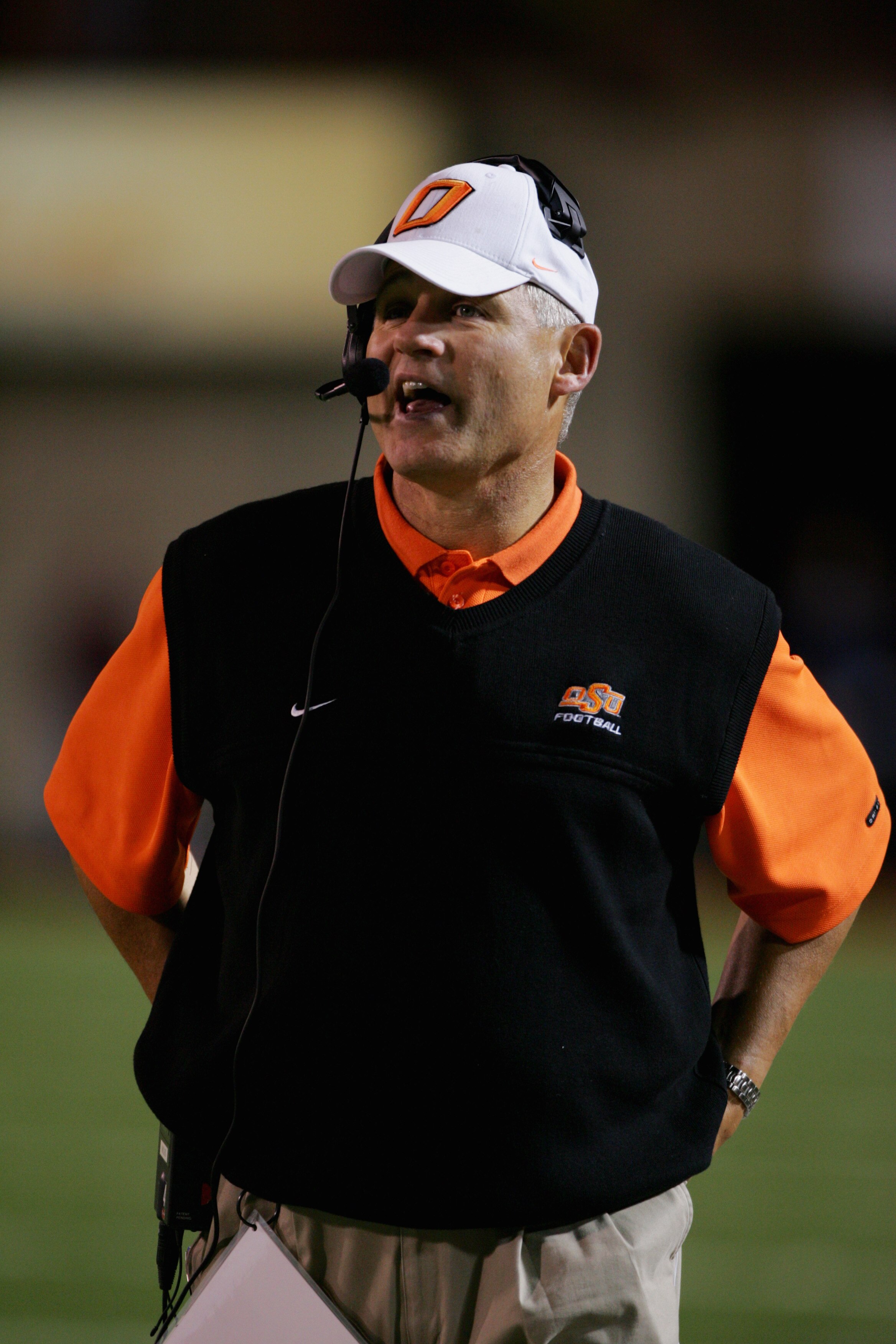 STILLWATER, OKLAHOMA - OCTOBER 16:  Les Miles of the Oklahoma State Cowboys watches the action from the sideline during the game against the Texas A&M Aggies at Boone Pickens Stadium on October 16, 2004 in Stillwater, Oklahoma. Texas A&M beat Oklahoma Sta