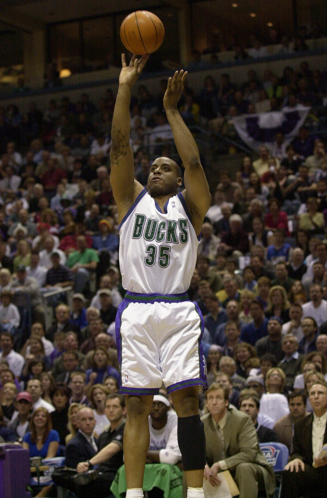 26 May 2001:  Jason Caffey #35 of the Milwaukee Bucks puts a shot up against the Philadelphia 76ers in game three of the eastern conference finals at the Bradley Center in Milwaukee, Wisconsin.  The Bucks won 80-74.  DIGITAL IMAGE.  Mandatory Credit: Otto