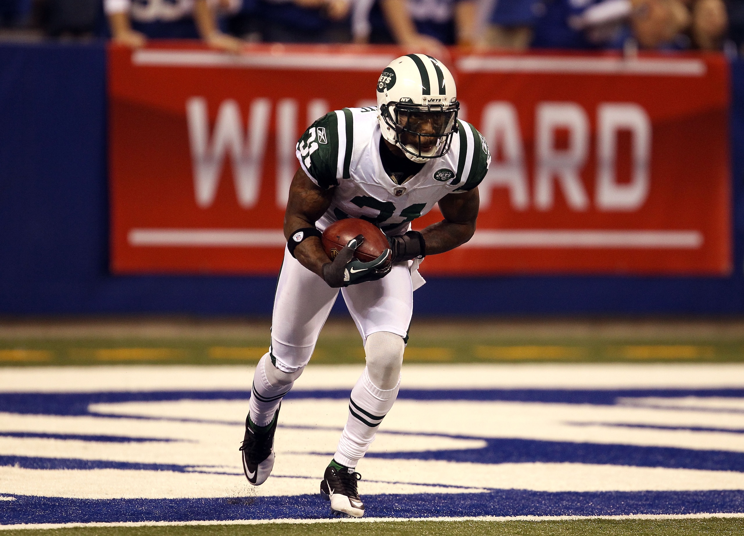 INDIANAPOLIS, IN - JANUARY 08:  Antonio Cromartie #31 of the New York Jets fields a kickoff which he returns 47-yards in the final minute of the fourth quarter against the Indianapolis Colts during their 2011 AFC wild card playoff game at Lucas Oil Stadiu
