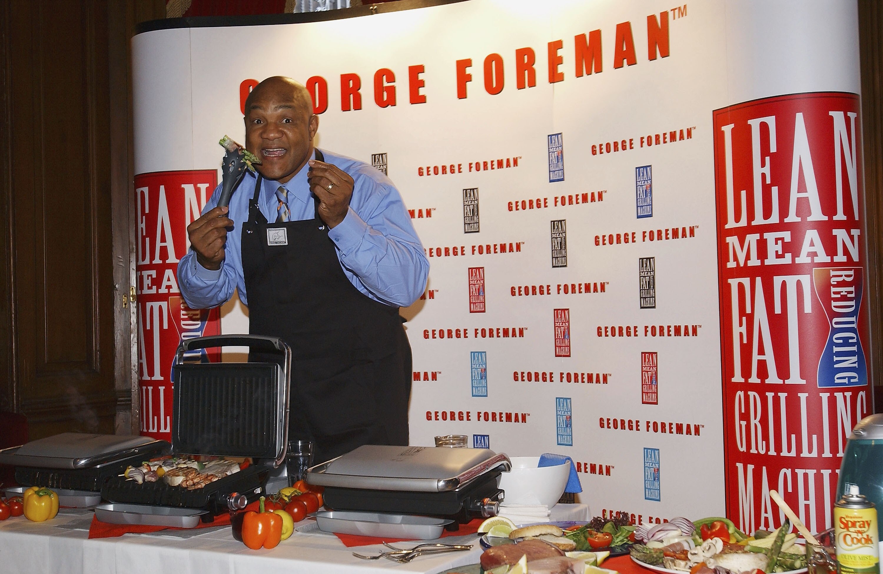 LONDON - DECEMBER 17:  Former World Heavyweight Champion George Foreman launches new additions to his Lean Mean range, at No 5, Cavendish Square on December 17, 2003 in London. New additions include the Lean Mean Toasting Machine and the Lean Mean Boiling