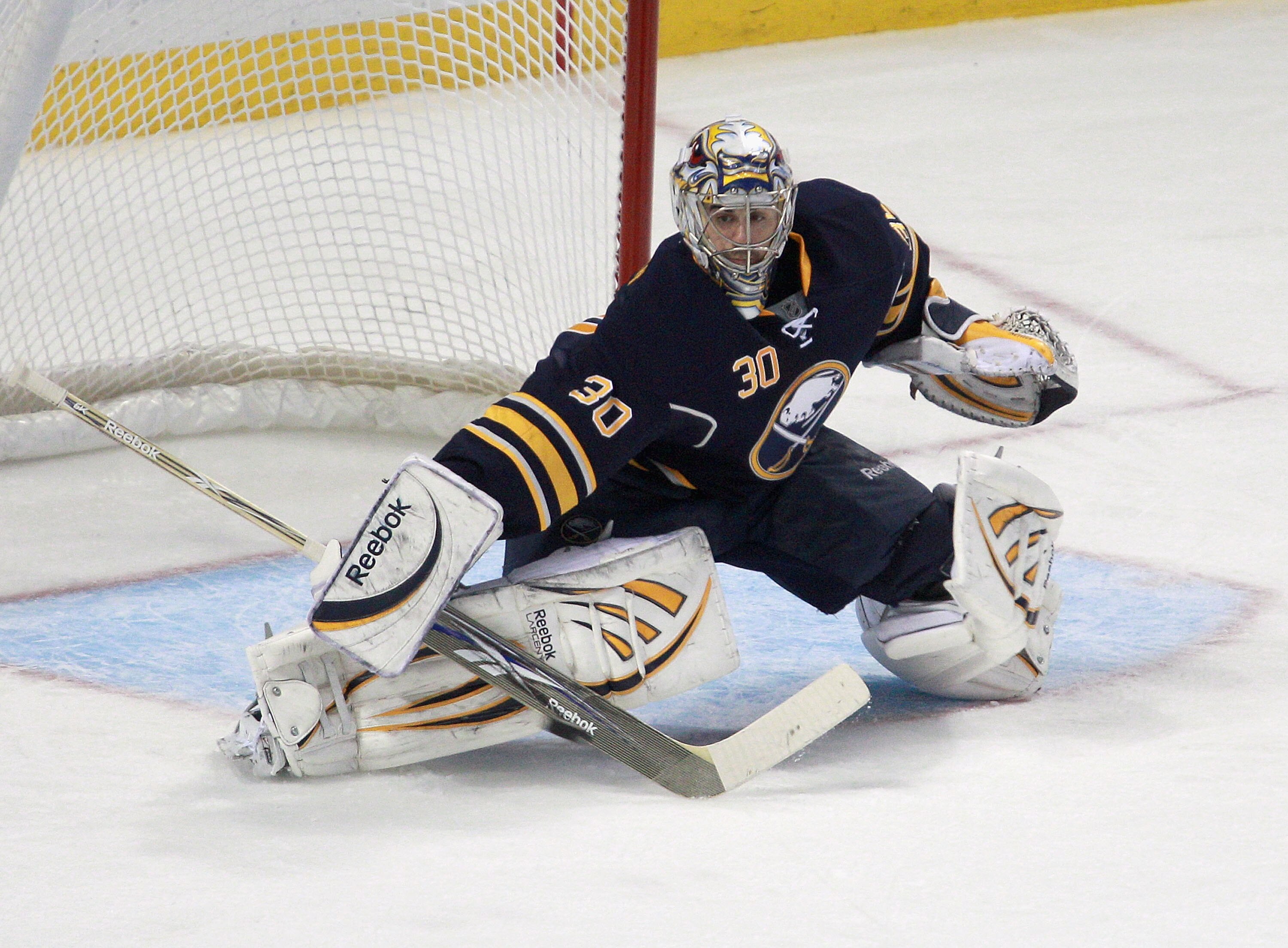 BUFFALO, NY - DECEMBER 23: Ryan Miller #30 of the Buffalo Sabres dflects a shot against the Florida Panthers at HSBC Arena on December 23, 2010 in Buffalo, New York. Florida won 4-3.  (Photo by Rick Stewart/Getty Images)