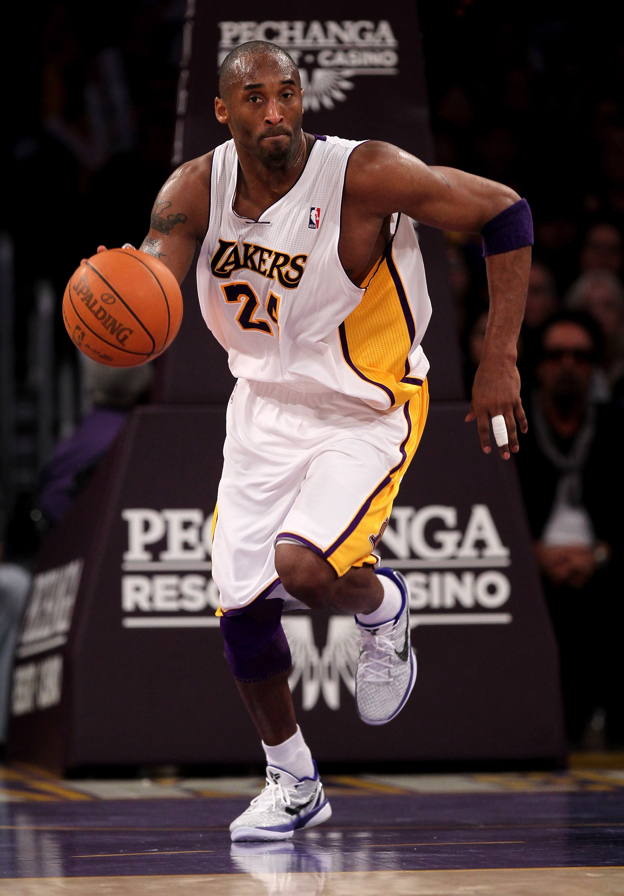 LOS ANGELES, CA - JANUARY 9: Kobe Bryant #24 of the Los Angeles Lakers starts a break against the New York Knicks at Staples Center on January 9, 2011 in Los Angeles, California.  The Lakers won 109-87.   NOTE TO USER: User expressly acknowledges and agre