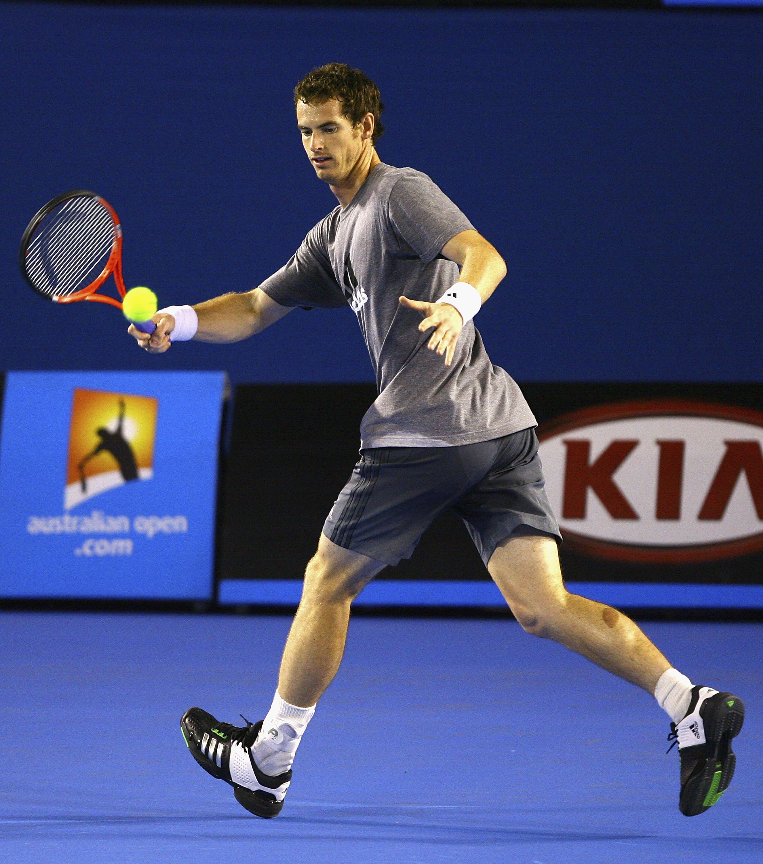 MELBOURNE, AUSTRALIA - JANUARY 10:  Andy Murray of Great Britain plays a forehand during a practice session ahead of the 2011 Australian Open at Melbourne Park on January 10, 2011 in Melbourne, Australia.  (Photo by Robert Prezioso/Getty Images)