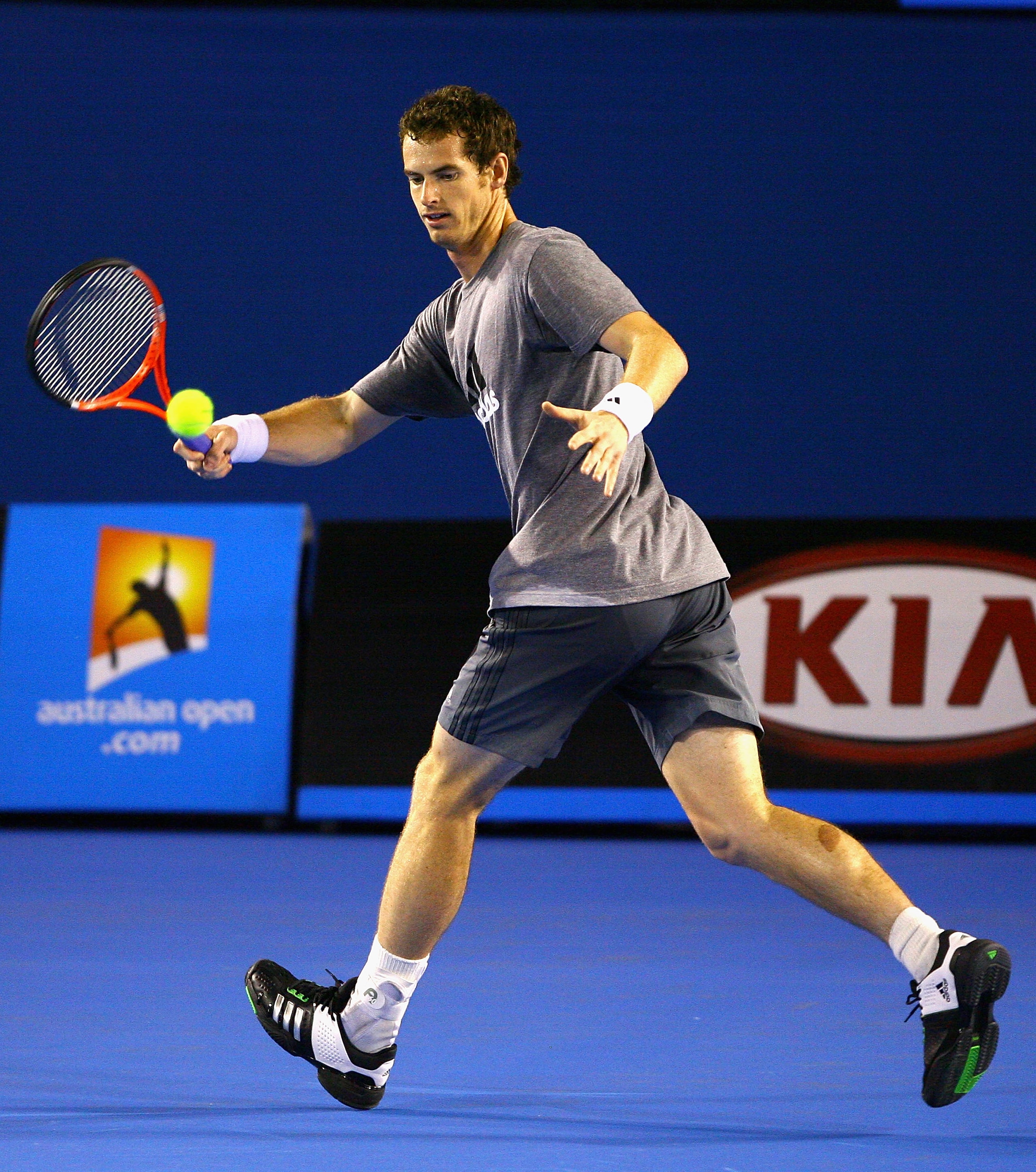 MELBOURNE, AUSTRALIA - JANUARY 10:  Andy Murray of Great Britain plays a forehand during a practice session ahead of the 2011 Australian Open at Melbourne Park on January 10, 2011 in Melbourne, Australia.  (Photo by Robert Prezioso/Getty Images)
