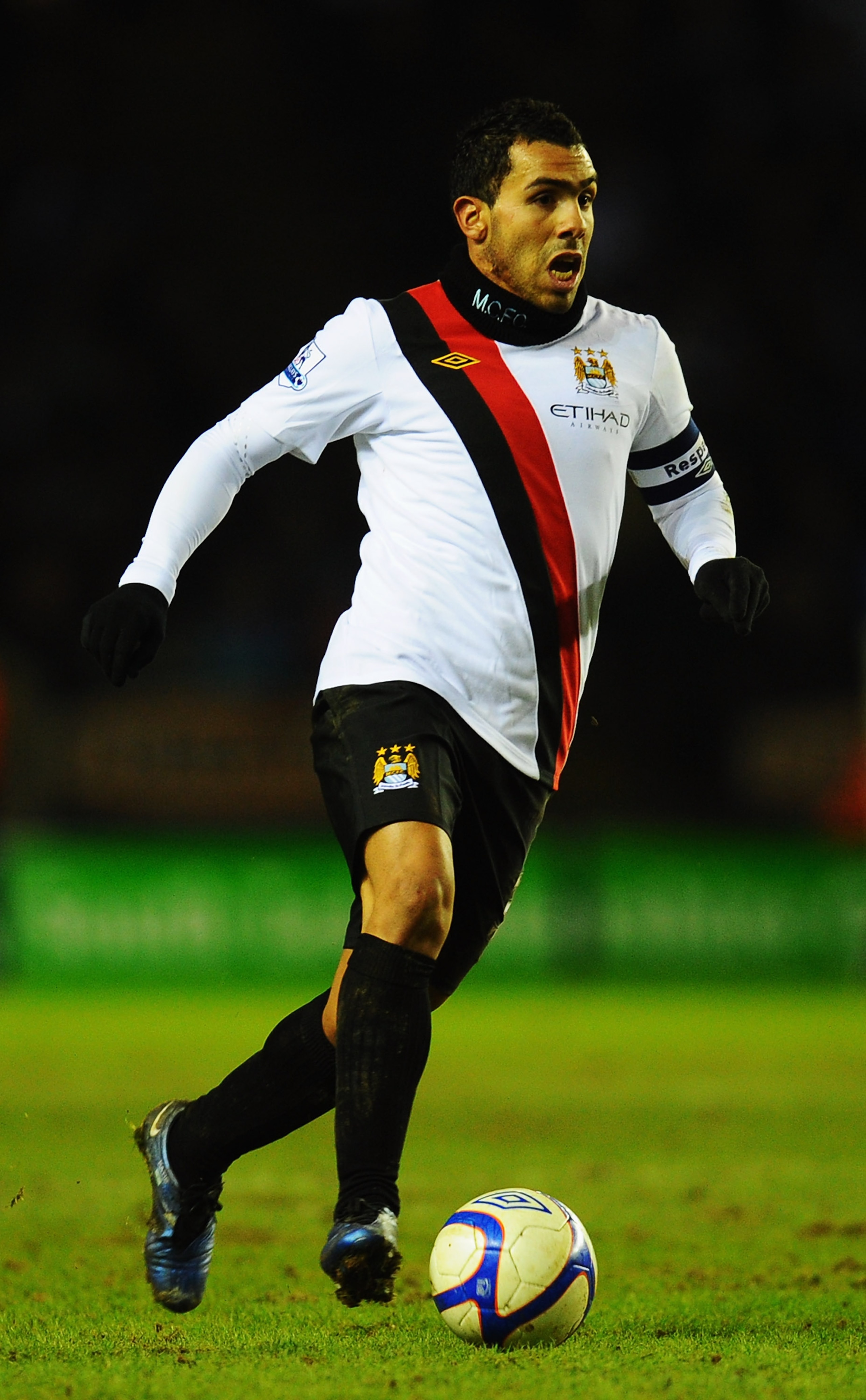 LEICESTER, UNITED KINGDOM - JANUARY 09:  Carlos Tevez of Manchester City runs with the ball during the FA Cup sponsored by E.ON 3rd Round match between between Leicester City and Manchester City at Walkers Stadium on January 9, 2011 in Leicester, England.