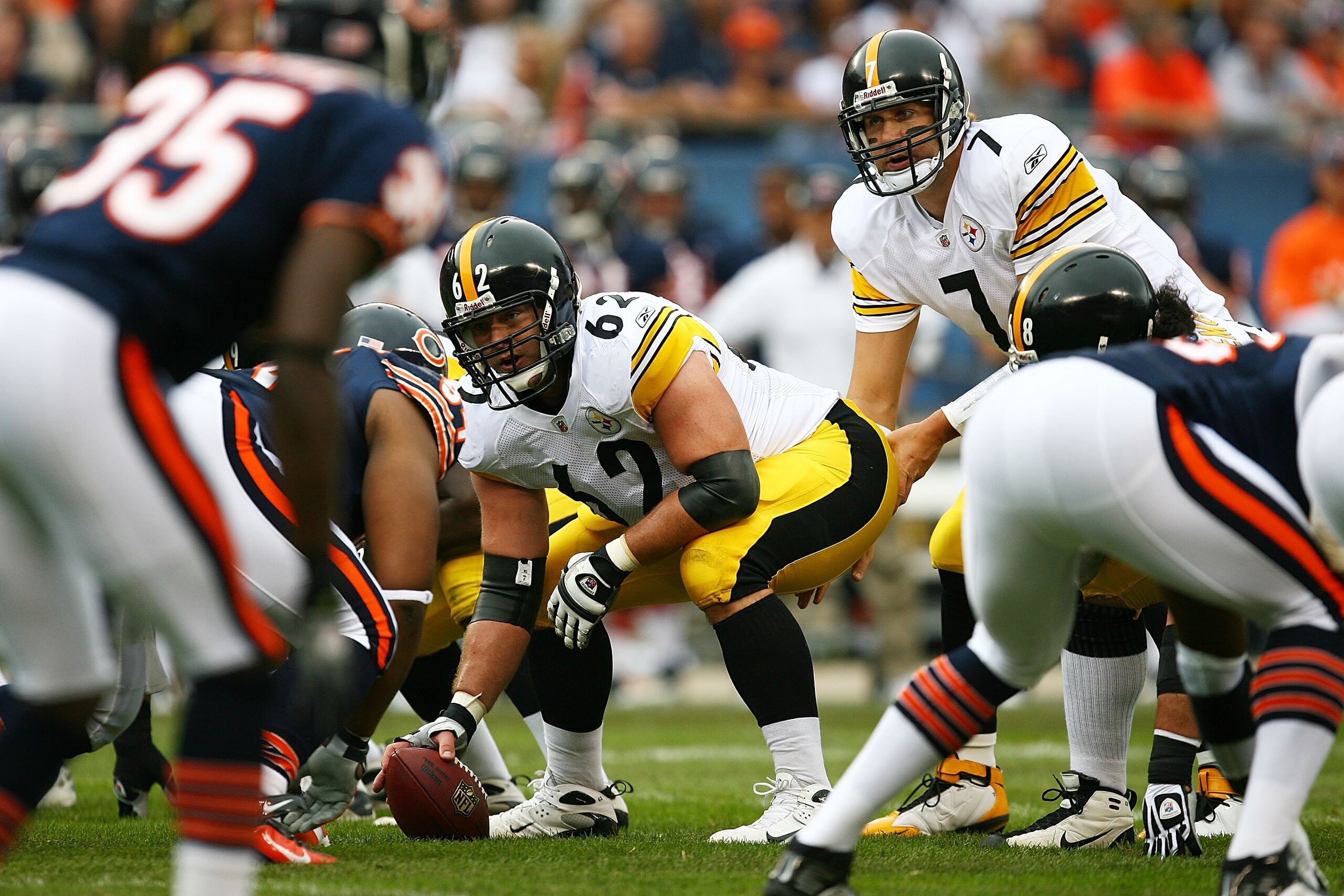 CHICAGO - SEPTEMBER 20: Ben Roethlisberger #7 of the Pittsburgh Steelers prepares to take the snap from center Justin Hartwig #62 against the Chicago Bears on September 20, 2009 at Soldier Field in Chicago, Illinois. The Bears defeated the Steelers 17-14.