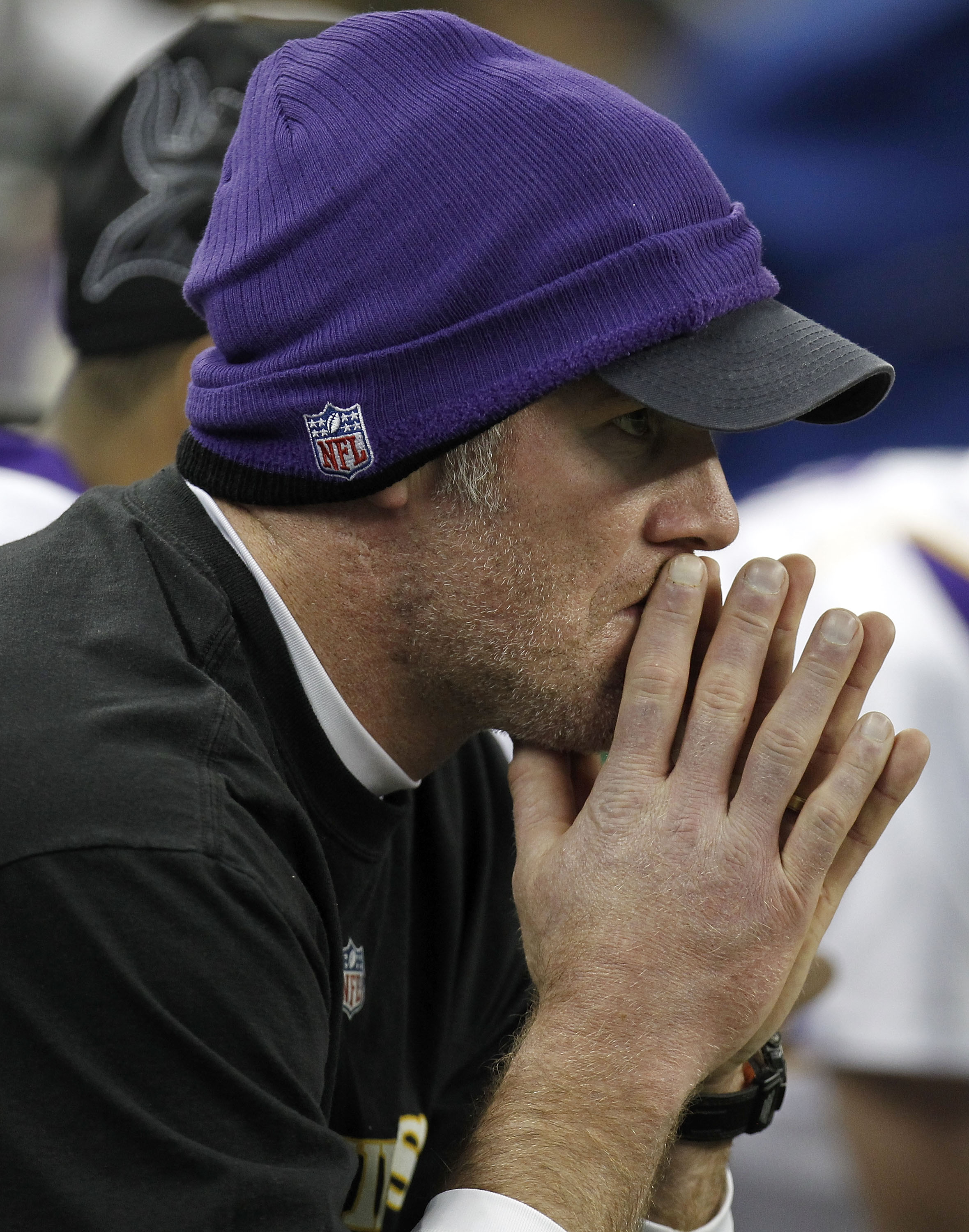 DETROIT, MI - JANUARY 02:  Brett Favre #4 of the Minnesota Vikings looks on from the bench while playing the Detroit Lions at Ford Field on January 2, 2011 in Detroit, Michigan.  (Photo by Gregory Shamus/Getty Images)