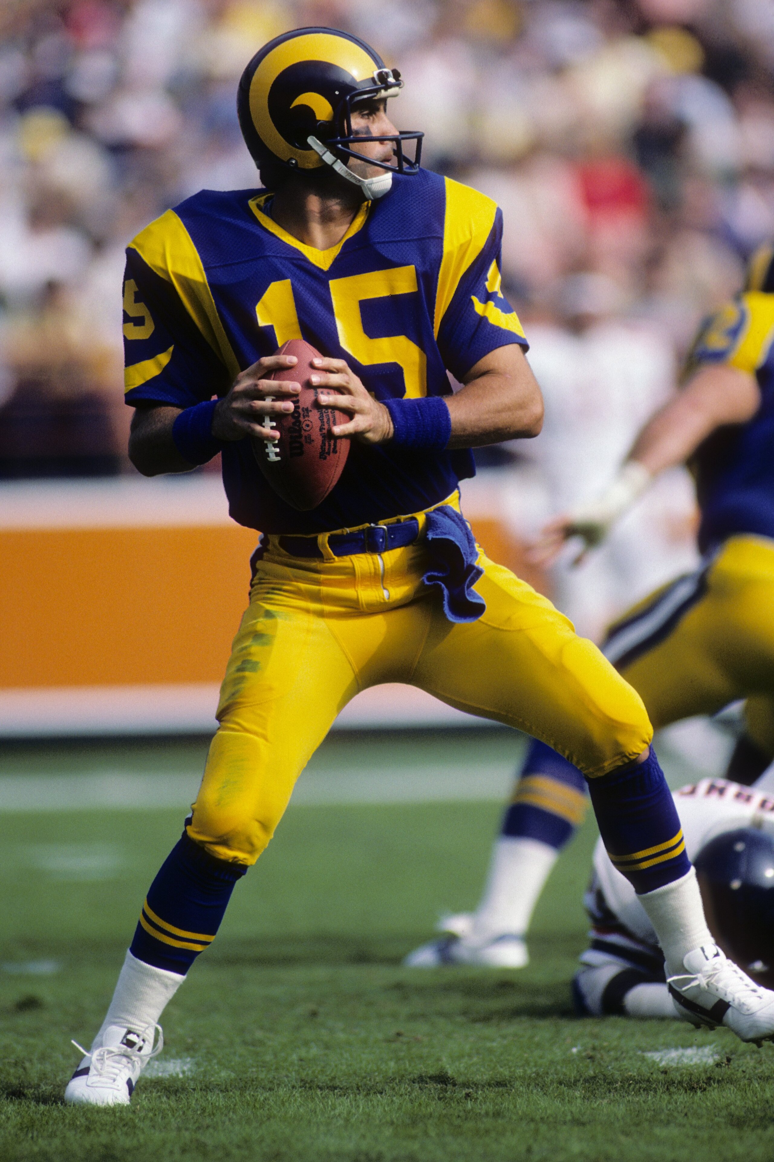 ANAHEIM, CA - NOVEMBER 6: Quarterback Vince Ferragamo #15 of the Los Angeles Rams looks to pass during the game against the Chicago Bears at Anaheim Stadium on November 6, 1983 in Anaheim, California. The Rams won 21-14. (Photo by George Rose/Getty Ima ANAHEIM, CA - NOVEMBER 6: Quarterback Vince Ferragamo #15 of the Los Angeles Rams looks to pass during the game against the Chicago Bears at Anaheim Stadium on November 6, 1983 in Anaheim, California. The Rams won 21-14. (Photo by George Rose/Getty Ima