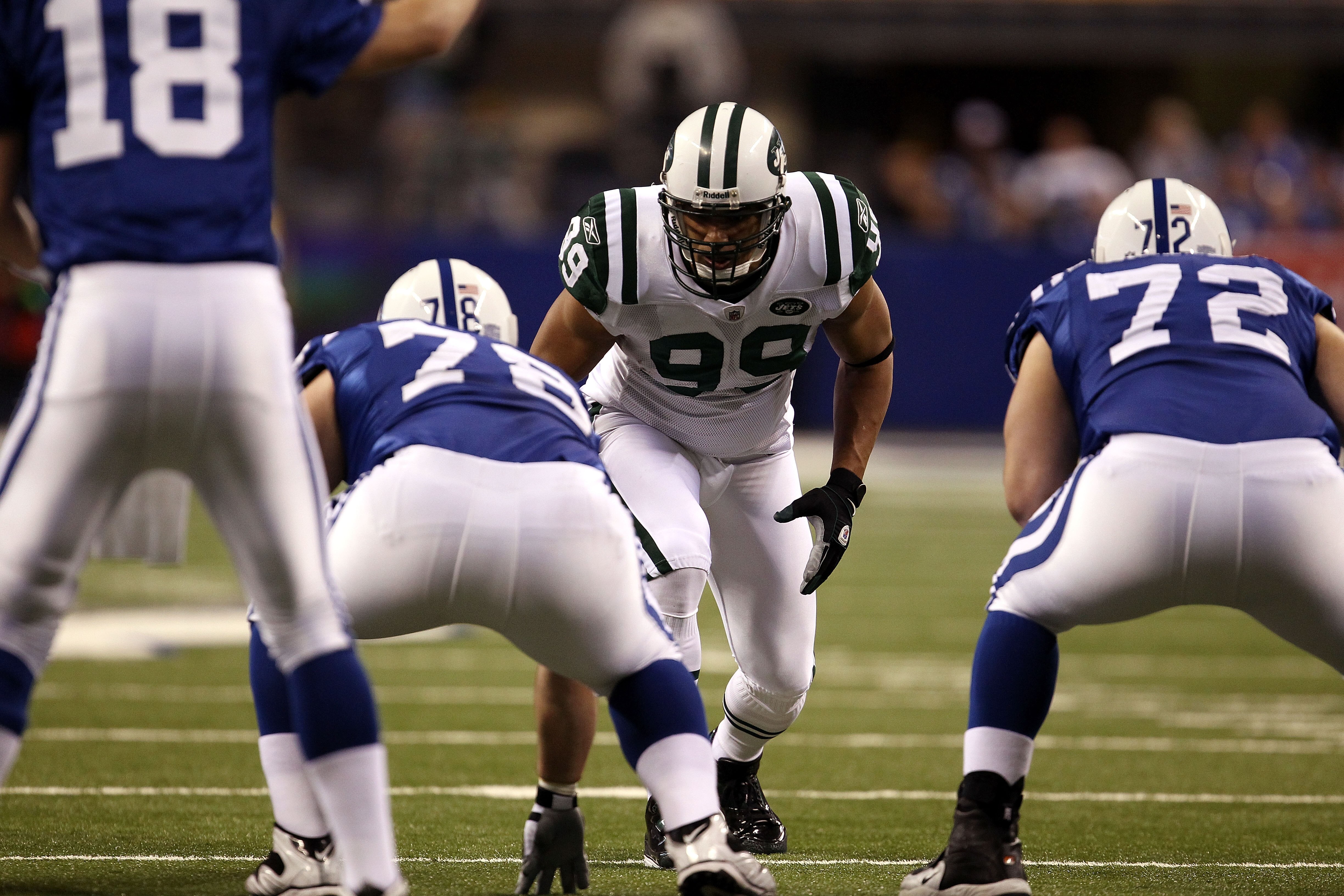 INDIANAPOLIS, IN - JANUARY 08:  Linebacker Jason Taylor #99 of the New York Jets lines up on defense against the Indianapolis Colts during their 2011 AFC wild card playoff game at Lucas Oil Stadium on January 8, 2011 in Indianapolis, Indiana. The Jets won