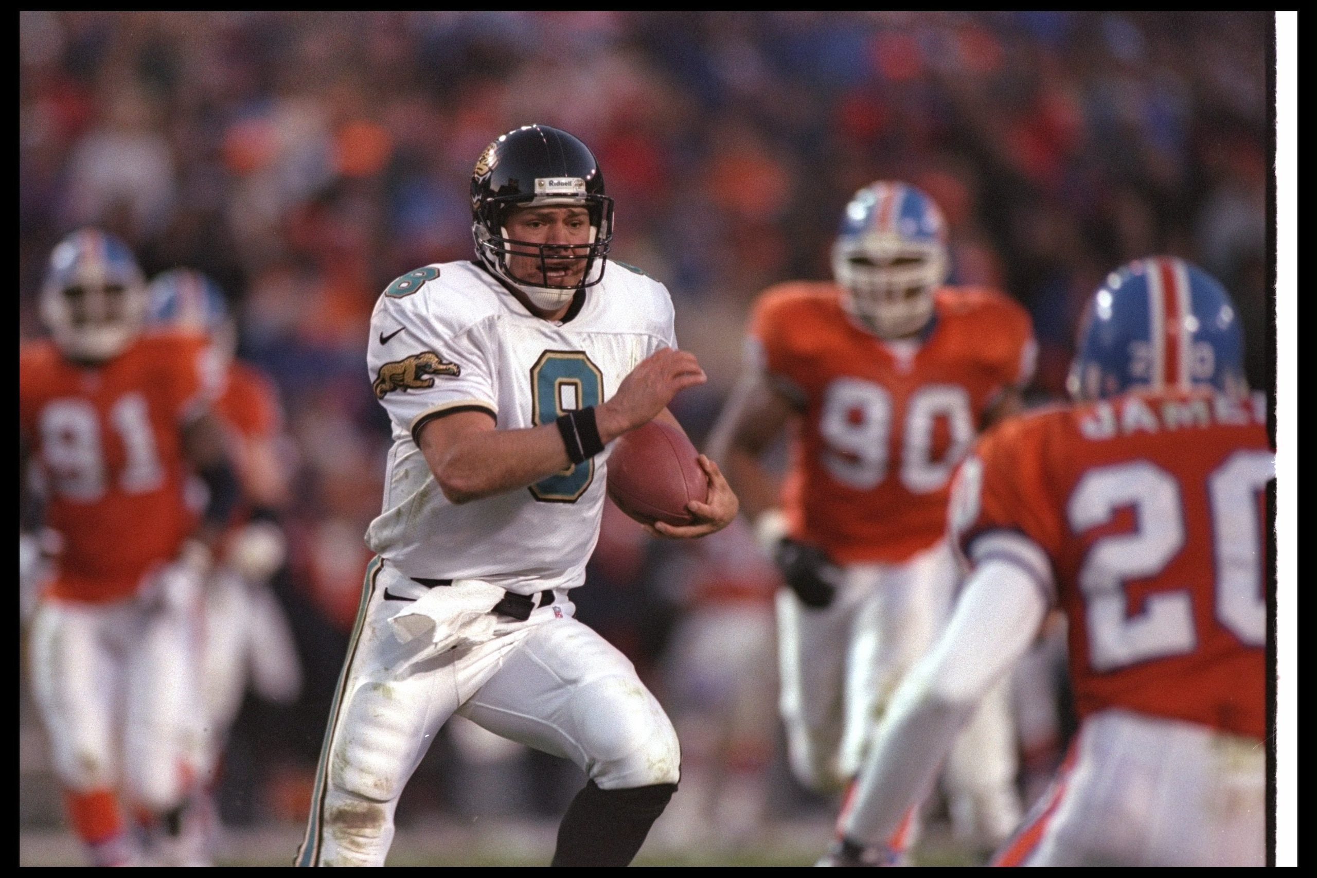 4 Jan 1997: Quarterback Mark Brunell of the Jacksonville Jaguars moves the ball during a playoff game against the Denver Broncos at Mile High Stadium in Denver, Colorado. The Jaguars won the game, 30-27. Mandatory Credit: Otto Greule /Allsport 4 Jan 1997: Quarterback Mark Brunell of the Jacksonville Jaguars moves the ball during a playoff game against the Denver Broncos at Mile High Stadium in Denver, Colorado. The Jaguars won the game, 30-27. Mandatory Credit: Otto Greule /Allsport