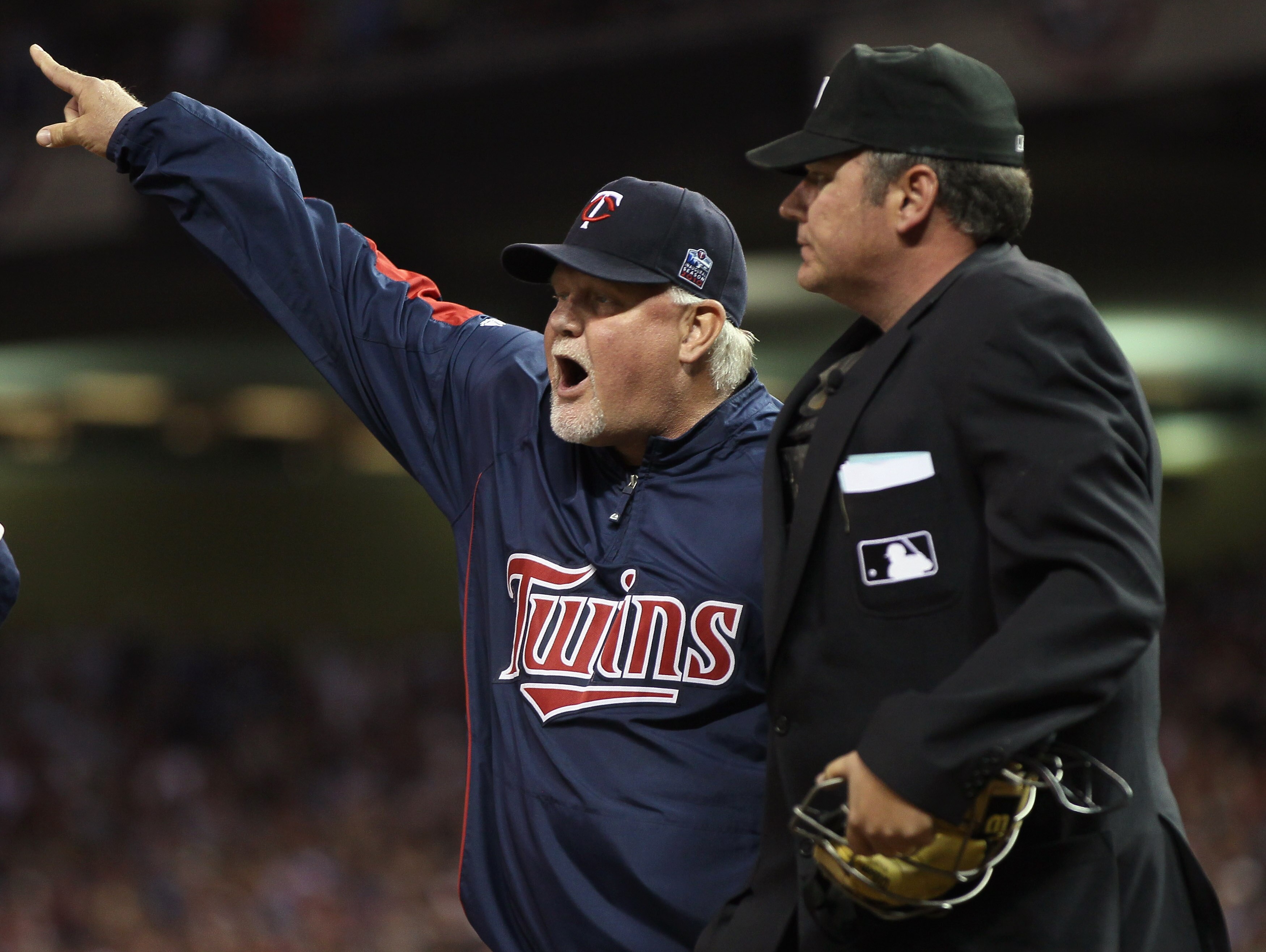 MINNEAPOLIS - OCTOBER 07:  Manager Ron Gardenhire #35 of the Minnesota Twins is ejected from the game by Hunter Wedelstedt in the seventh inning against the New York Yankees during game two of the ALDS on October 7, 2010 at Target Field in Minneapolis, Mi
