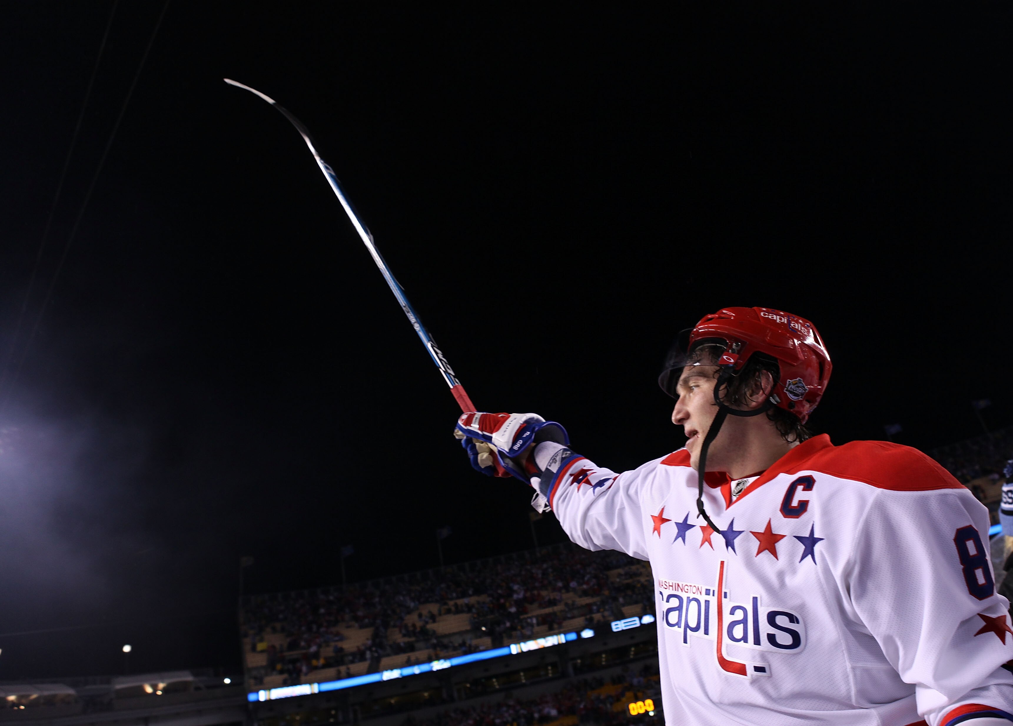 PITTSBURGH, PA - JANUARY 01:  Alex Ovechkin #8 of the Washington Capitals celebrates their 3-1 victory over the Pittsburgh Penguins during the 2011 NHL Bridgestone Winter Classic at Heinz Field on January 1, 2011 in Pittsburgh, Pennsylvania.  (Photo by Ja