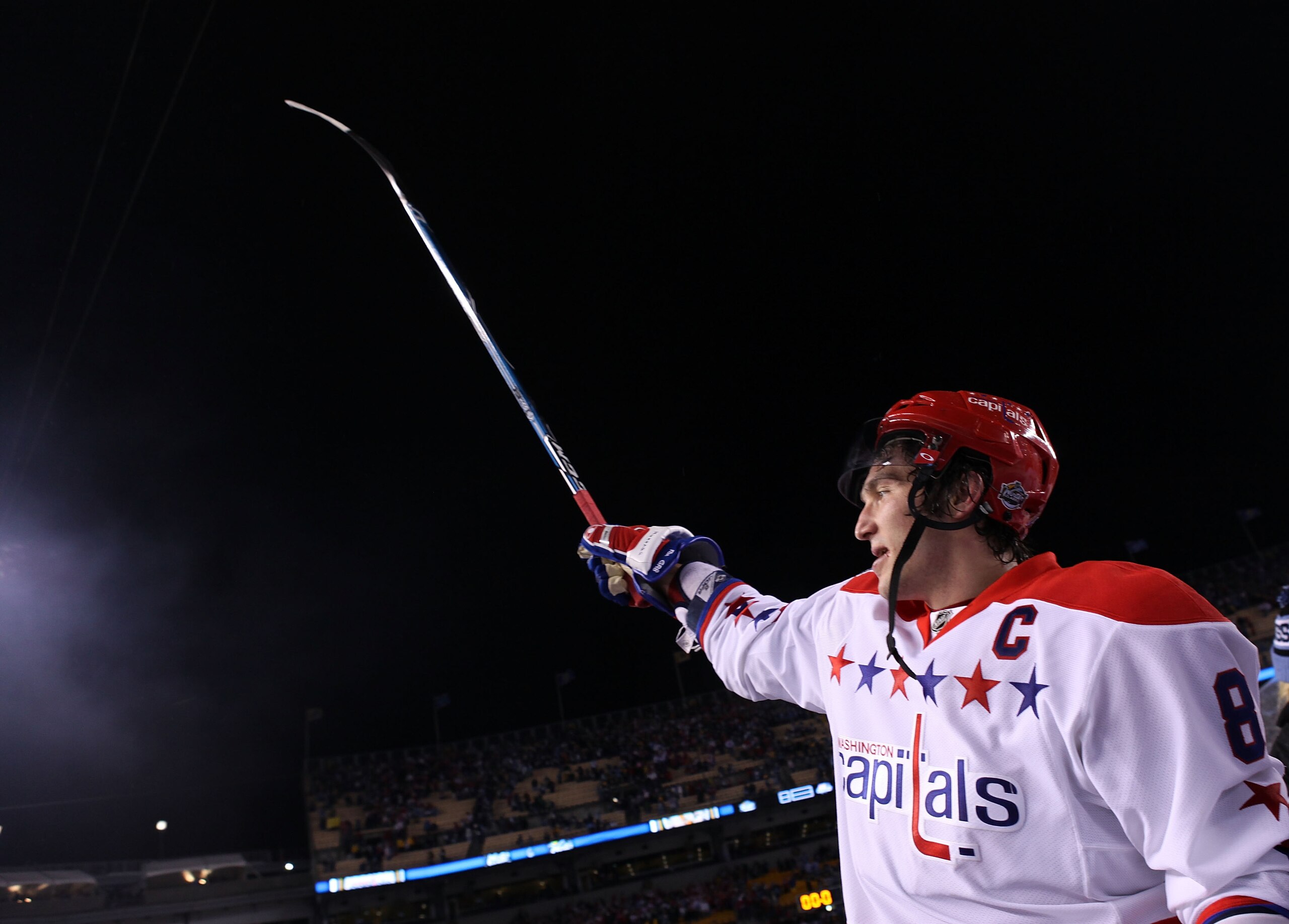 PITTSBURGH, PA - JANUARY 01:  Alex Ovechkin #8 of the Washington Capitals celebrates their 3-1 victory over the Pittsburgh Penguins during the 2011 NHL Bridgestone Winter Classic at Heinz Field on January 1, 2011 in Pittsburgh, Pennsylvania.  (Photo by Ja