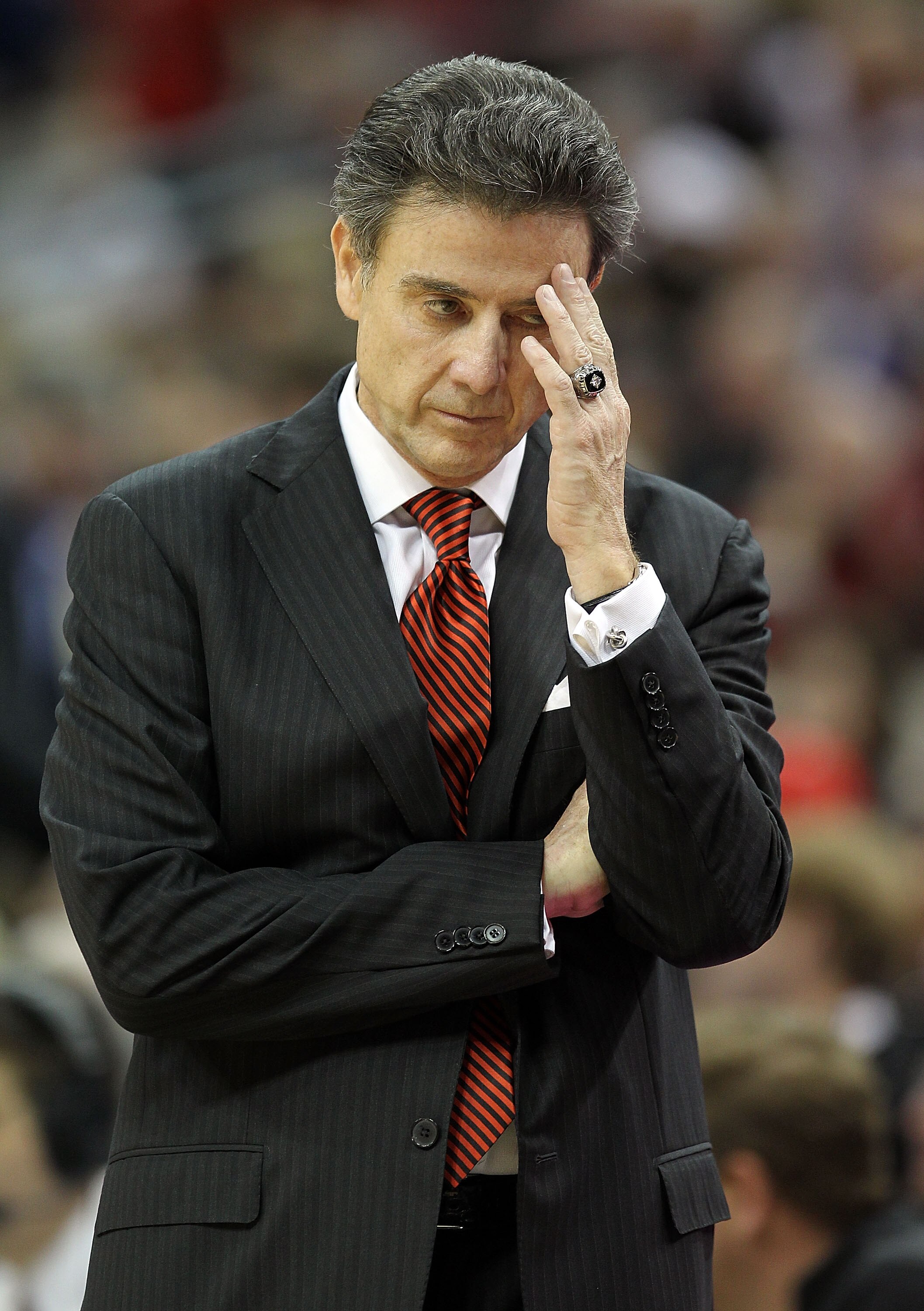 LOUISVILLE, KY - DECEMBER 31:  Rick Pitino the Head Coach of the Louisville Cardinals reacts to a turnover during the game against the Kentucky Wildcats at the KFC Yum! Center on December 31, 2010 in Louisville, Kentucky. Kentucky won 78-63. (Photo by And