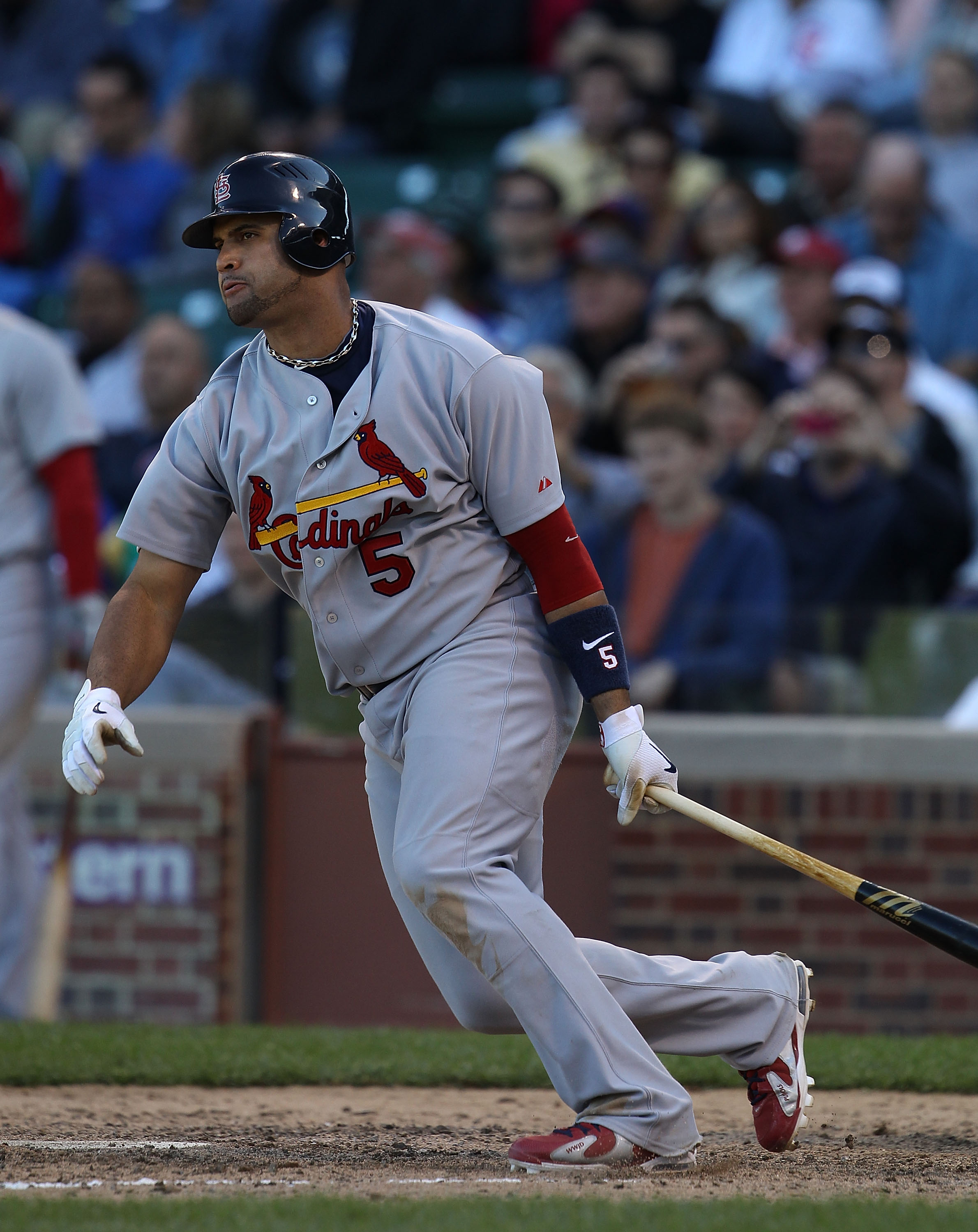 CHICAGO - SEPTEMBER 24: Albert Pujols #5 of the St. Louis Cardinals hits a single in the 9th inning against the Chicago Cubs at Wrigley Field on September 24, 2010 in Chicago, Illinois. The Cardinals defeated the Cubs 7-1. (Photo by Jonathan Daniel/Getty 