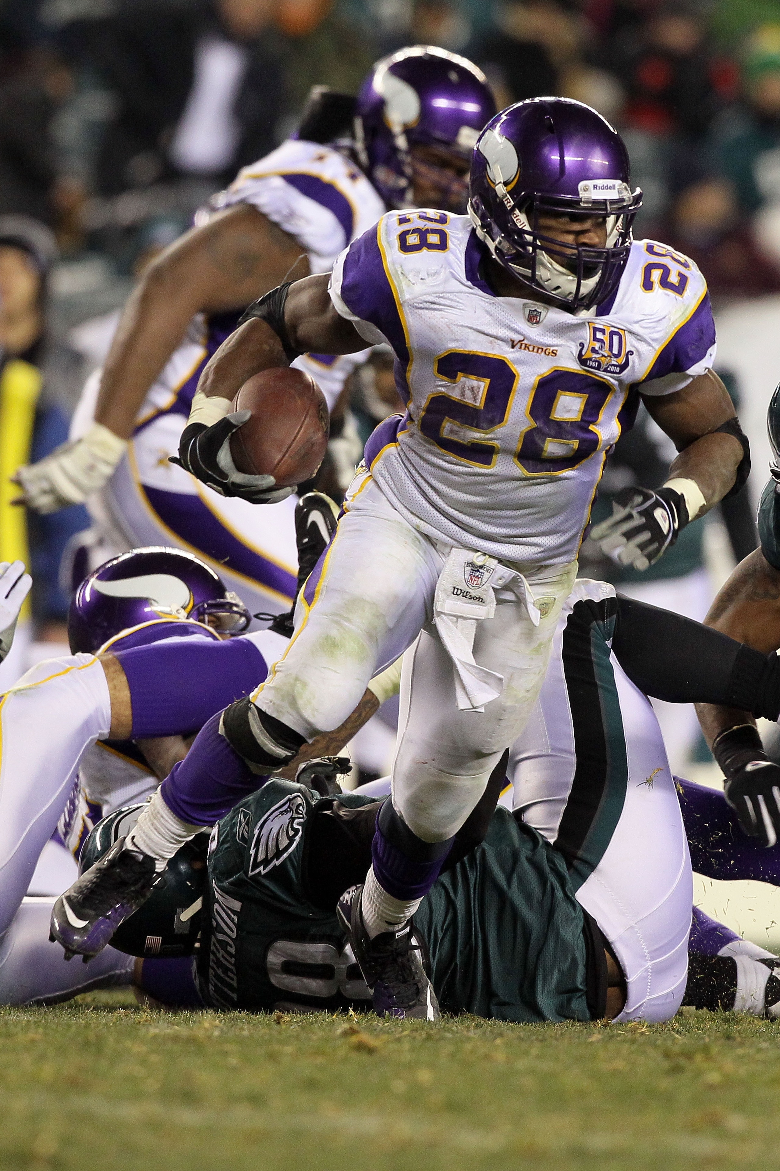 PHILADELPHIA, PA - DECEMBER 28: Adrian Peterson #28 of the Minnesota Vikings runs against the Philadelphia Eagles at Lincoln Financial Field on December 26, 2010 in Philadelphia, Pennsylvania. (Photo by Jim McIsaac/Getty Images) PHILADELPHIA, PA - DECEMBER 28: Adrian Peterson #28 of the Minnesota Vikings runs against the Philadelphia Eagles at Lincoln Financial Field on December 26, 2010 in Philadelphia, Pennsylvania. (Photo by Jim McIsaac/Getty Images)