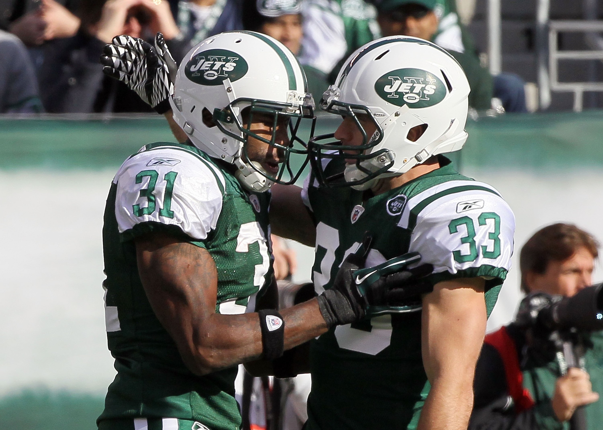 EAST RUTHERFORD, NJ - NOVEMBER 21:  Antonio Cromartie #31 and Eric Smith #33 of the New York Jets in action against the Houston Texans on November 21, 2010 at the New Meadowlands Stadium in East Rutherford, New Jersey.  (Photo by Jim McIsaac/Getty Images)