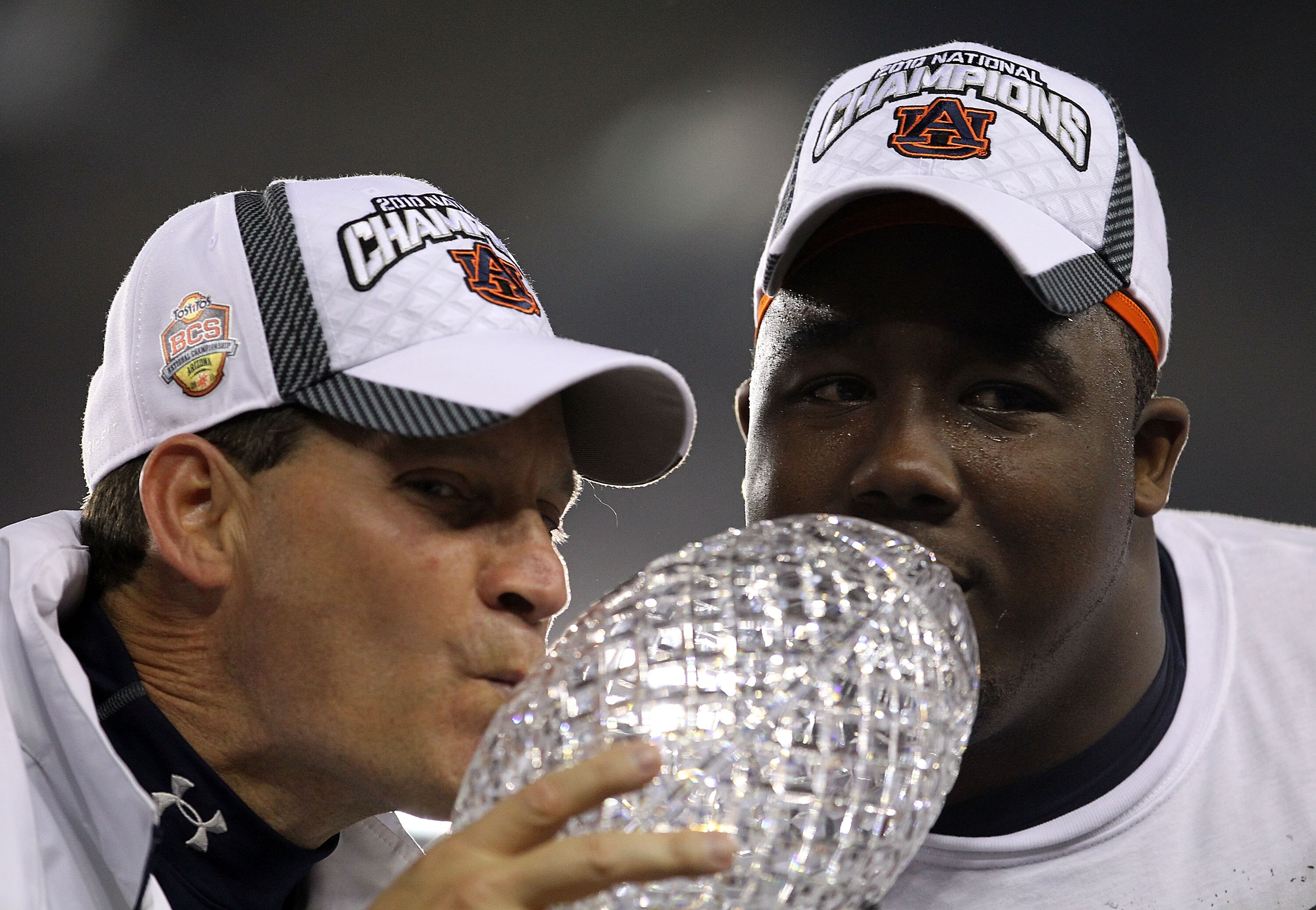 GLENDALE, AZ - JANUARY 10:  Head coach Gene Chizik and Nick Fairley #90 of the Auburn Tigers celebrate the Tigers 22-19 victory against the Oregon Ducks during the Tostitos BCS National Championship Game at University of Phoenix Stadium on January 10, 201