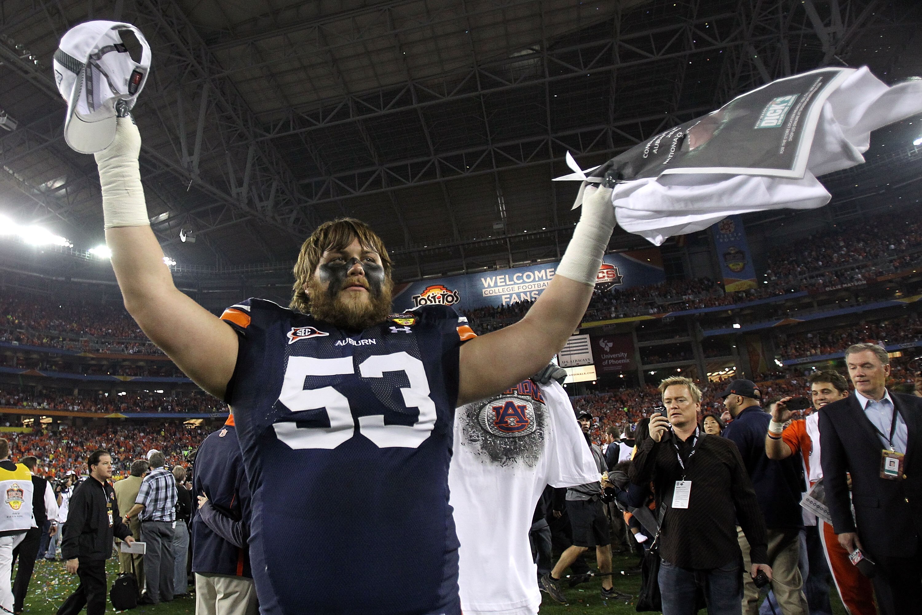 GLENDALE, AZ - JANUARY 10:  Bart Eddins #53 of the Auburn Tigers celebrates the Tigers 22-19 victory against the Oregon Ducks in the Tostitos BCS National Championship Game at University of Phoenix Stadium on January 10, 2011 in Glendale, Arizona.  (Photo
