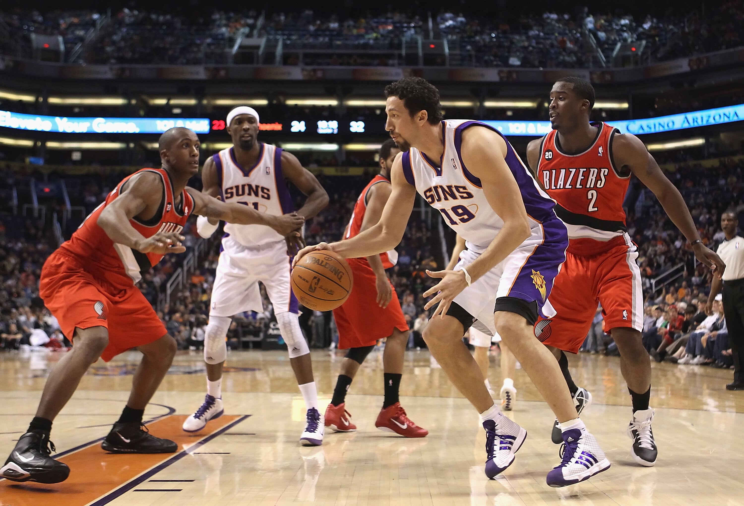 PHOENIX - DECEMBER 10:  Hedo Turkoglu #19 of the Phoenix Suns handles the ball during the NBA game against the Portland Trail Blazers at US Airways Center on December 10, 2010 in Phoenix, Arizona. The Trail Blazers defeated the Suns 101-94.  NOTE TO USER:
