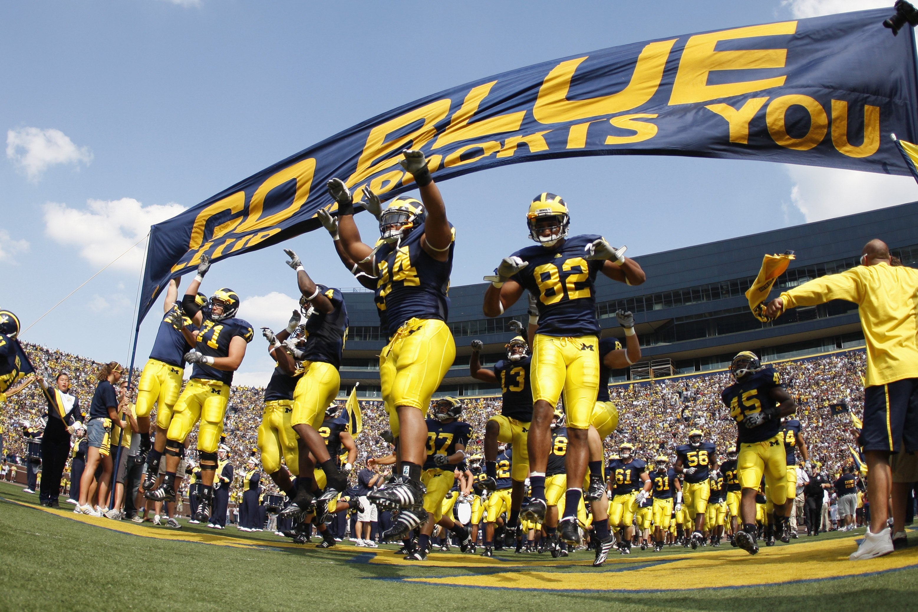 ANN ARBOR, MI - SEPTEMBER 5:  Michigan Wolverines players enter the stadium before the game against the Western Michigan Broncos on September 5, 2009 at Michigan Stadium in Ann Arbor, Michigan. (Photo by Gregory Shamus/Getty Images)