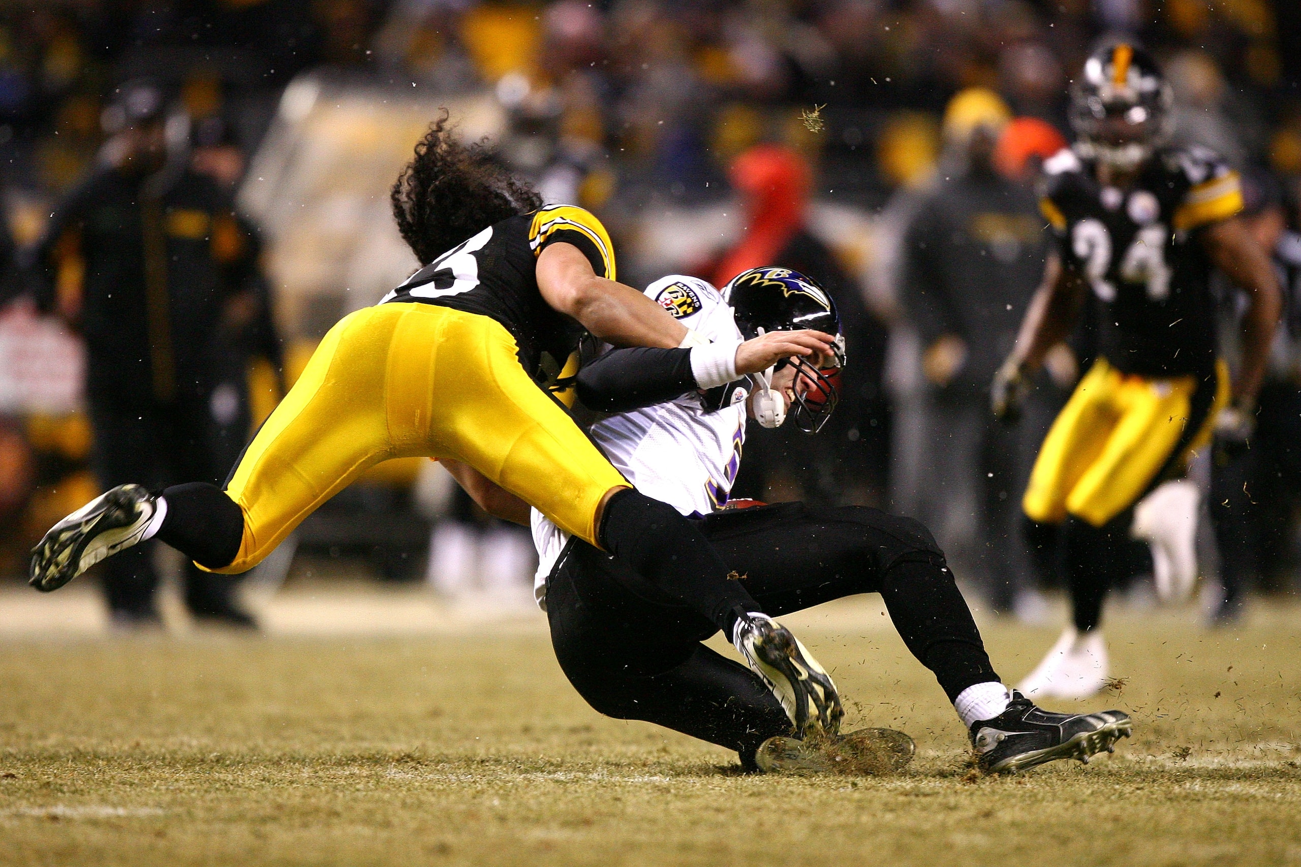 PITTSBURGH - JANUARY 18:  Troy Polamalu #43 of the Pittsburgh Steelers runs down Joe Flacco #5 of the Baltimore Ravens during the AFC Championship game on January 18, 2009 at Heinz Field in Pittsburgh, Pennsylvania.  (Photo by Al Bello/Getty Images)